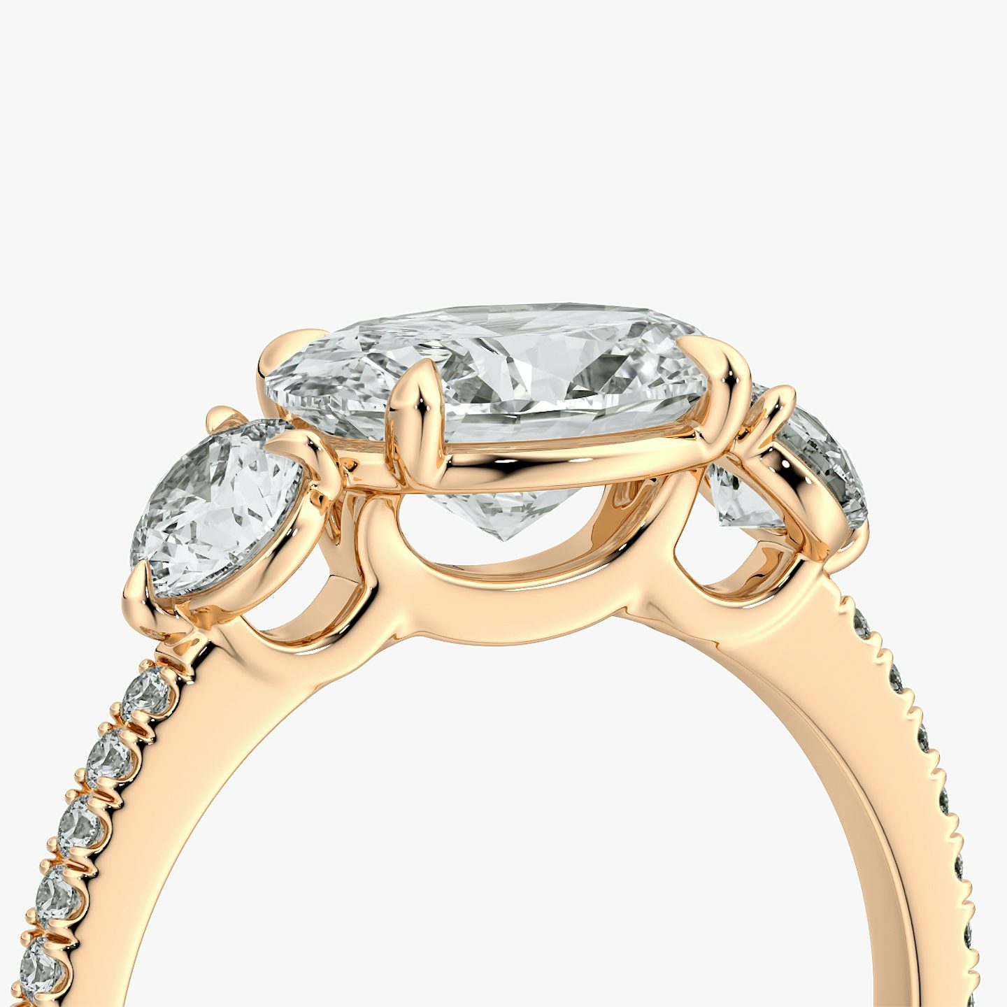The Three Stone | Oval | 14k | Rose Gold | bandAccent: Pavé | diamondOrientation: horizontal | sideStoneCarat: 0.25ct | sideStoneShape: Round Brilliant | caratWeight: other