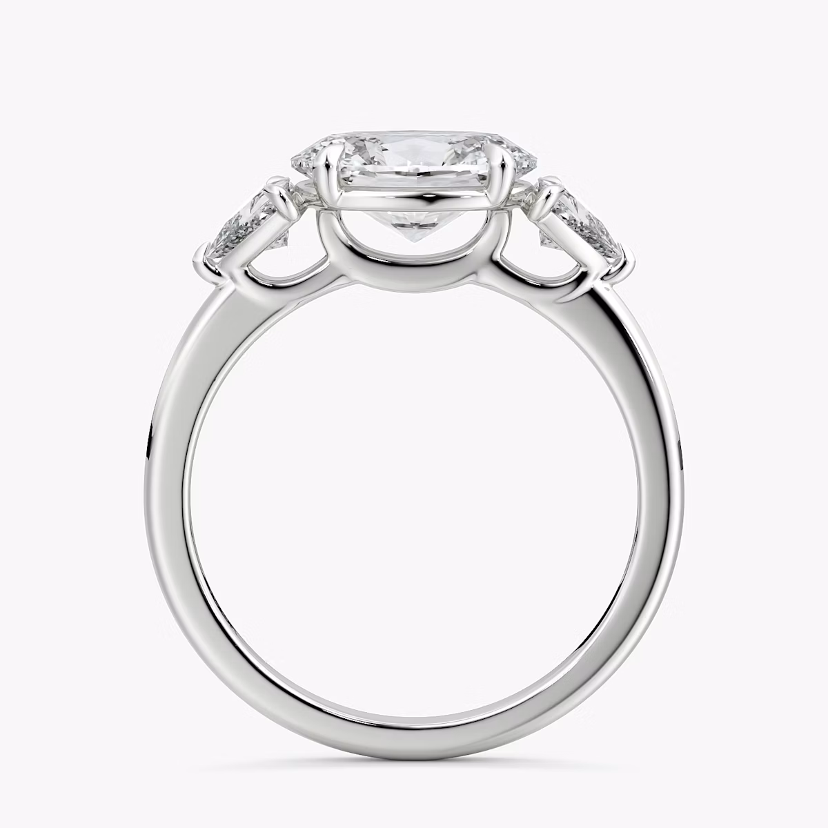 The Three Stone | Oval | Platinum | bandAccent: Plain | diamondOrientation: horizontal | sideStoneCarat: 0.25ct | sideStoneShape: Trillion | caratWeight: other