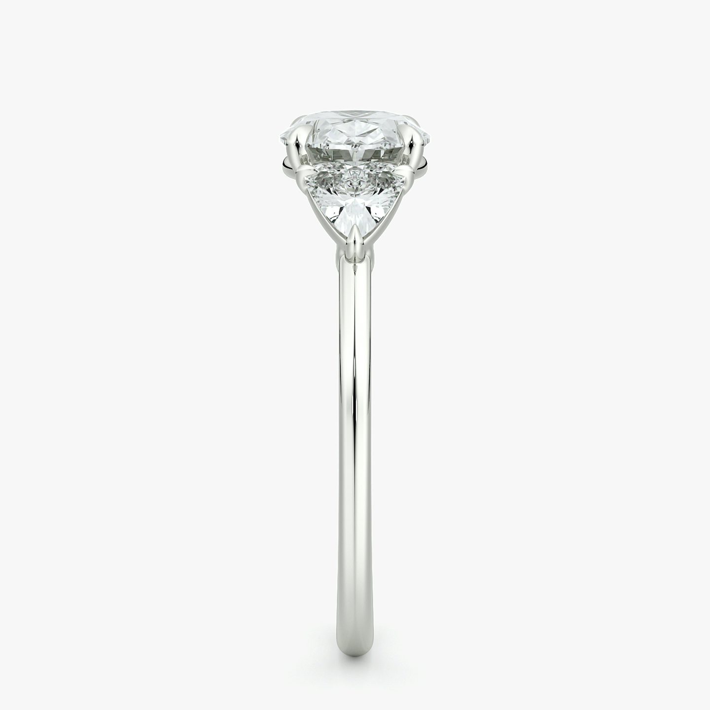 The Three Stone | Oval | 18k | White Gold | bandAccent: Plain | diamondOrientation: horizontal | sideStoneCarat: 0.25ct | sideStoneShape: Trillion | caratWeight: other
