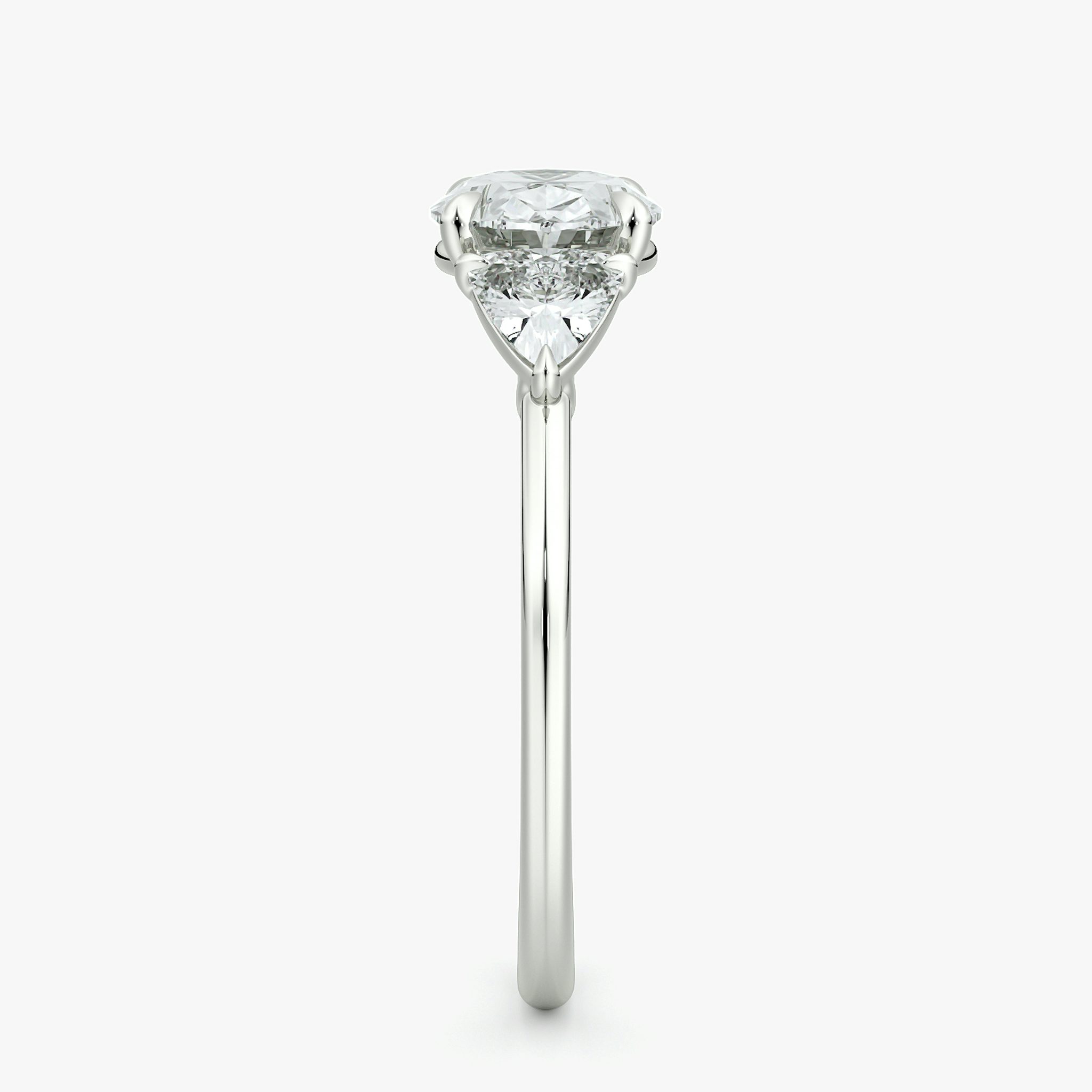 The Three Stone | Oval | 18k | White Gold | bandAccent: Plain | diamondOrientation: horizontal | sideStoneCarat: 0.25ct | sideStoneShape: Trillion | caratWeight: other