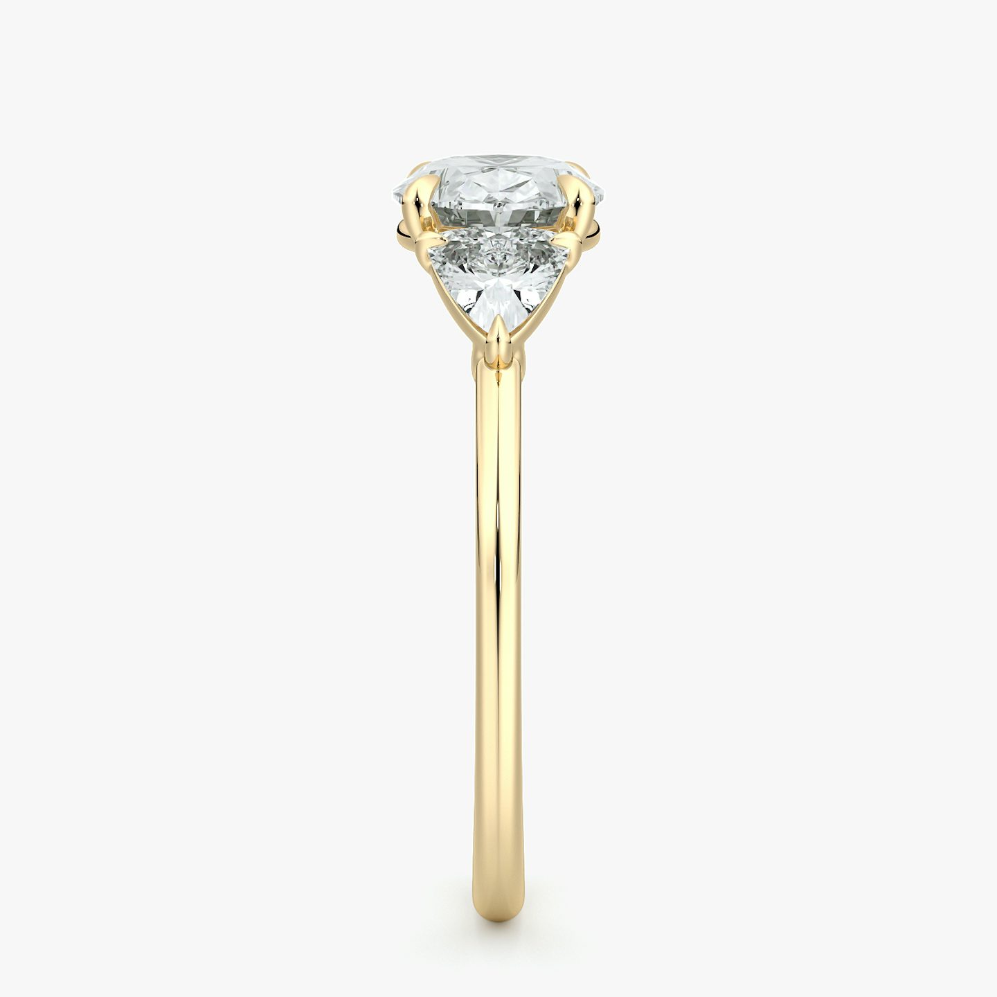 The Three Stone | Oval | 18k | Yellow Gold | bandAccent: Plain | diamondOrientation: horizontal | sideStoneCarat: 0.25ct | sideStoneShape: Trillion | caratWeight: other