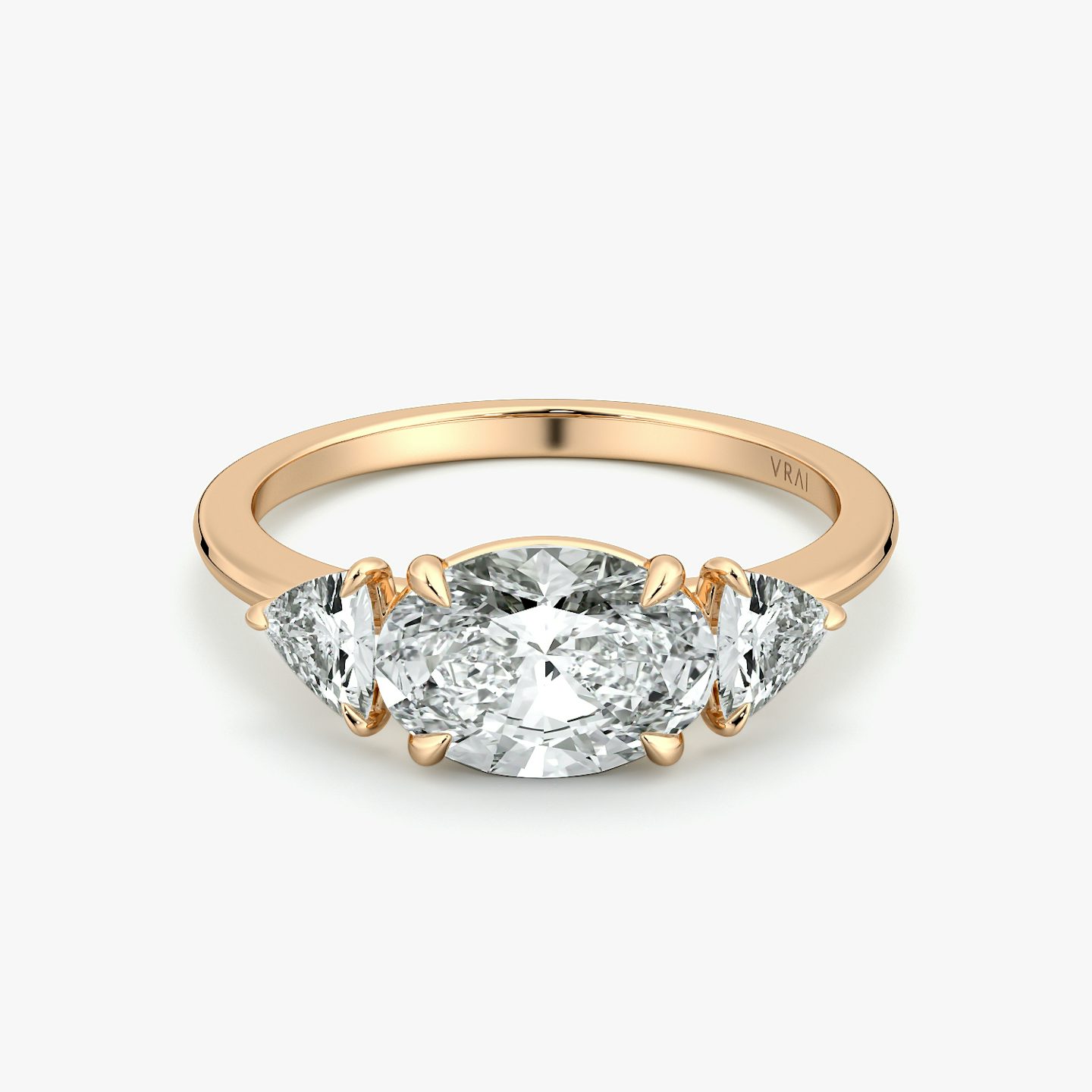 The Three Stone | Oval | 14k | Rose Gold | bandAccent: Plain | diamondOrientation: horizontal | sideStoneCarat: 0.25ct | sideStoneShape: Trillion | caratWeight: other