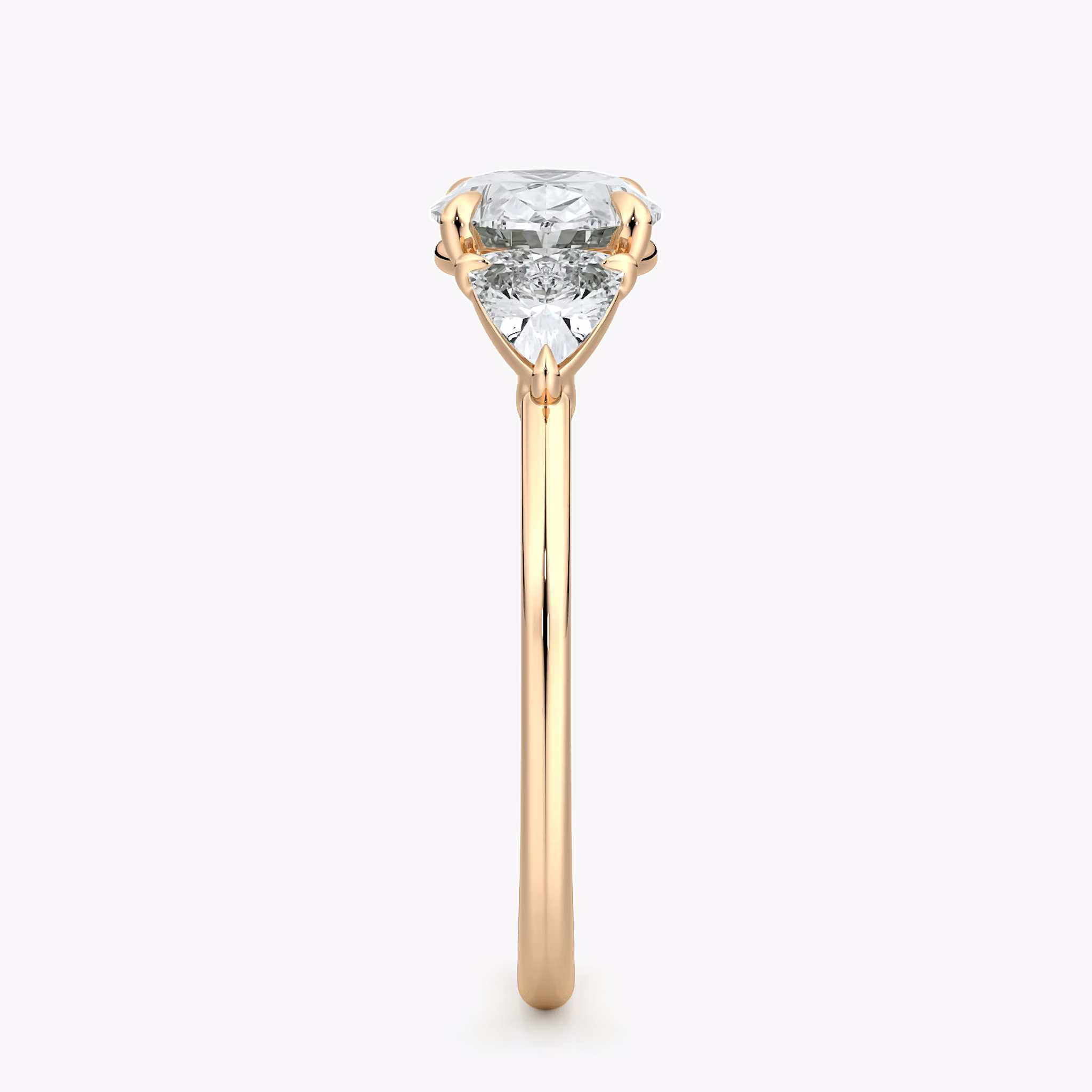 The Three Stone | Oval | 14k | Rose Gold | bandAccent: Plain | diamondOrientation: horizontal | sideStoneCarat: 0.25ct | sideStoneShape: Trillion | caratWeight: other