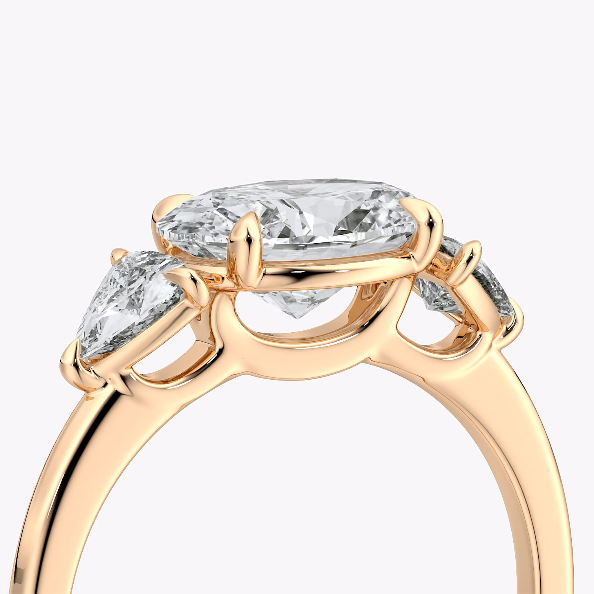 The Three Stone | Oval | 14k | Rose Gold | bandAccent: Plain | diamondOrientation: horizontal | sideStoneCarat: 0.25ct | sideStoneShape: Trillion | caratWeight: other