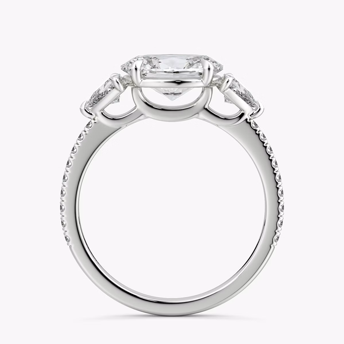 The Three Stone | Oval | 18k | White Gold | bandAccent: Pavé | diamondOrientation: horizontal | sideStoneCarat: 0.25ct | sideStoneShape: Trillion | caratWeight: other