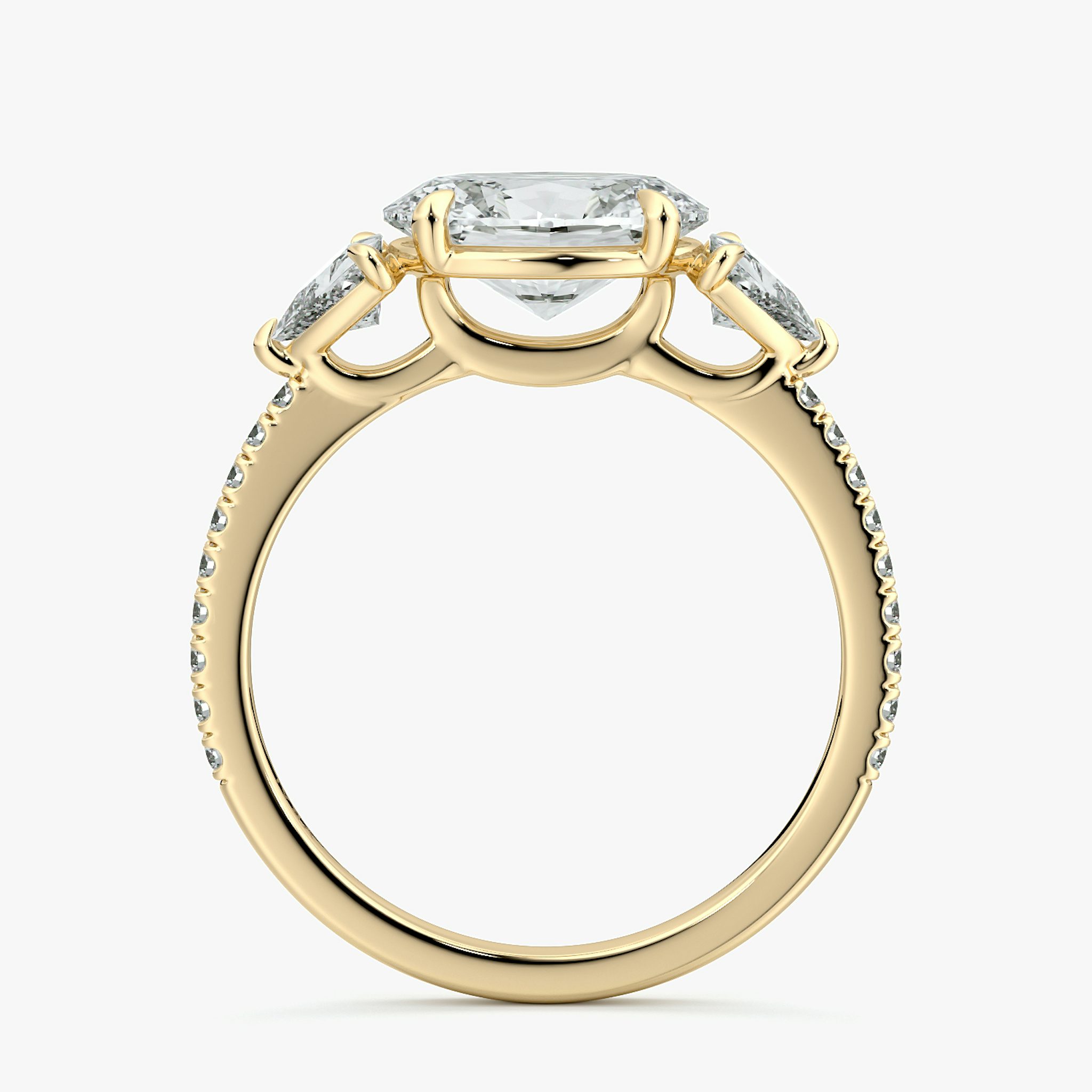 The Three Stone | Oval | 18k | Yellow Gold | bandAccent: Pavé | diamondOrientation: horizontal | sideStoneCarat: 0.25ct | sideStoneShape: Trillion | caratWeight: other