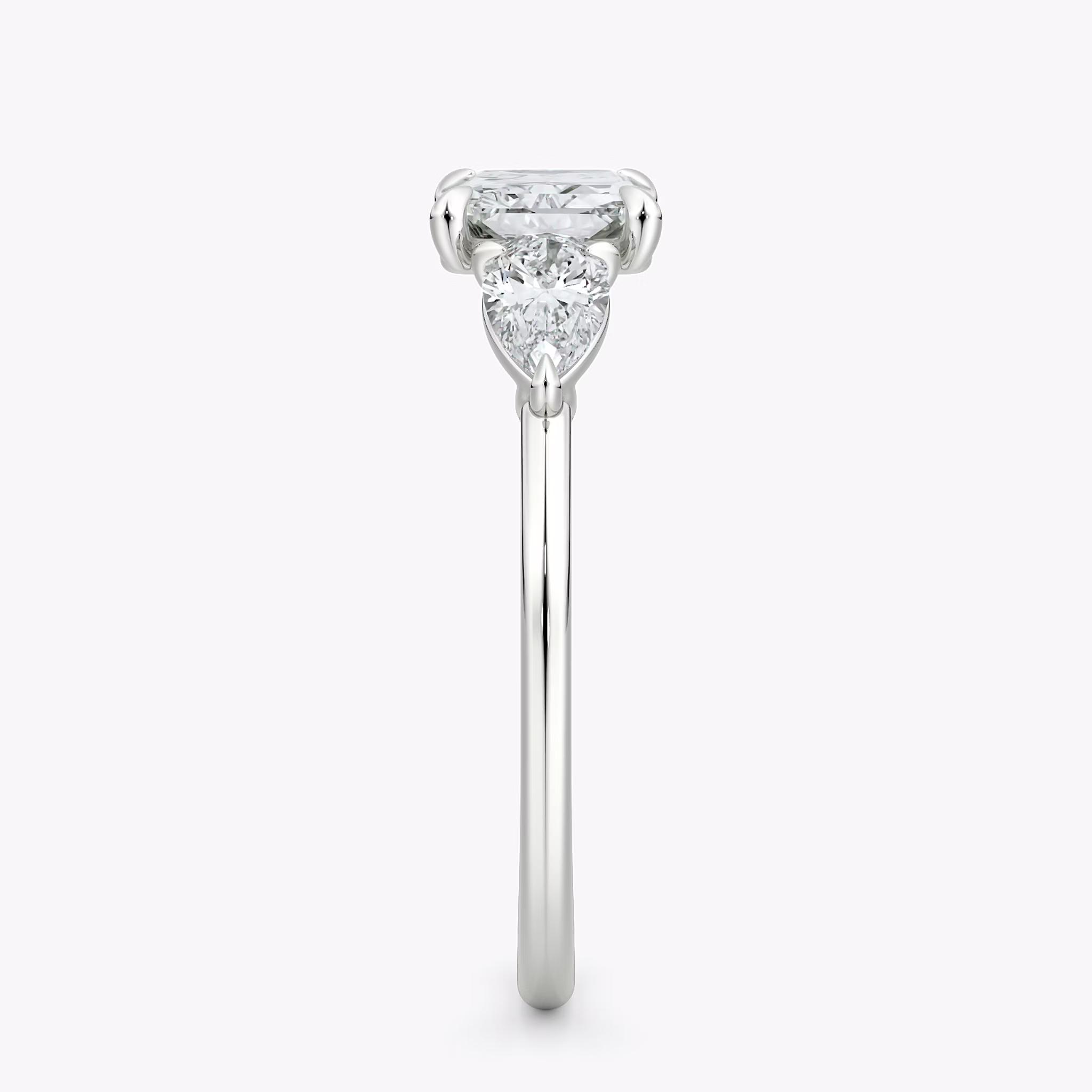 The Three Stone | Radiant | 18k | White Gold | bandAccent: Plain | diamondOrientation: horizontal | sideStoneCarat: 0.25ct | sideStoneShape: Pear | caratWeight: other