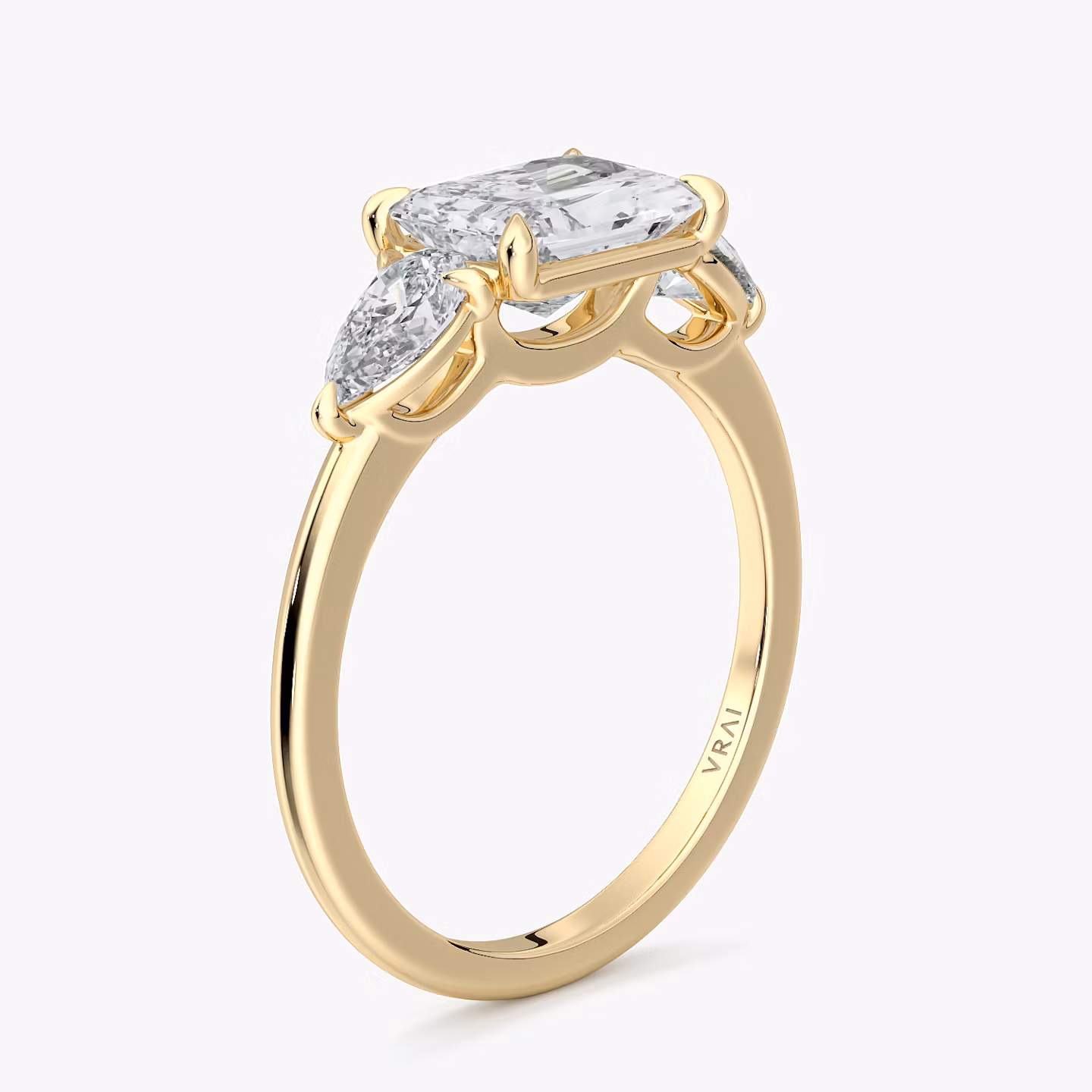 The Three Stone | Radiant | 18k | Yellow Gold | bandAccent: Plain | diamondOrientation: horizontal | sideStoneCarat: 0.25ct | sideStoneShape: Pear | caratWeight: other