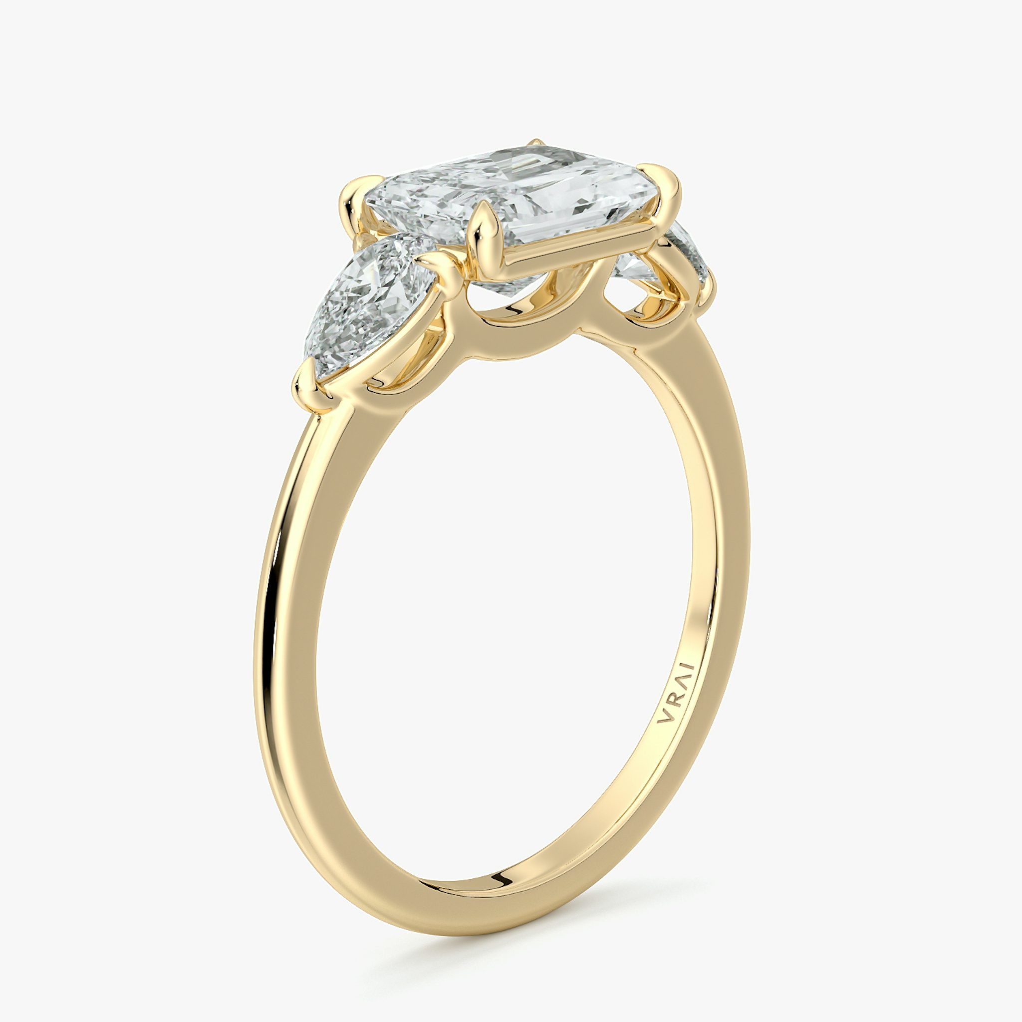 The Three Stone | Radiant | 18k | Yellow Gold | bandAccent: Plain | diamondOrientation: horizontal | sideStoneCarat: 0.25ct | sideStoneShape: Pear | caratWeight: other