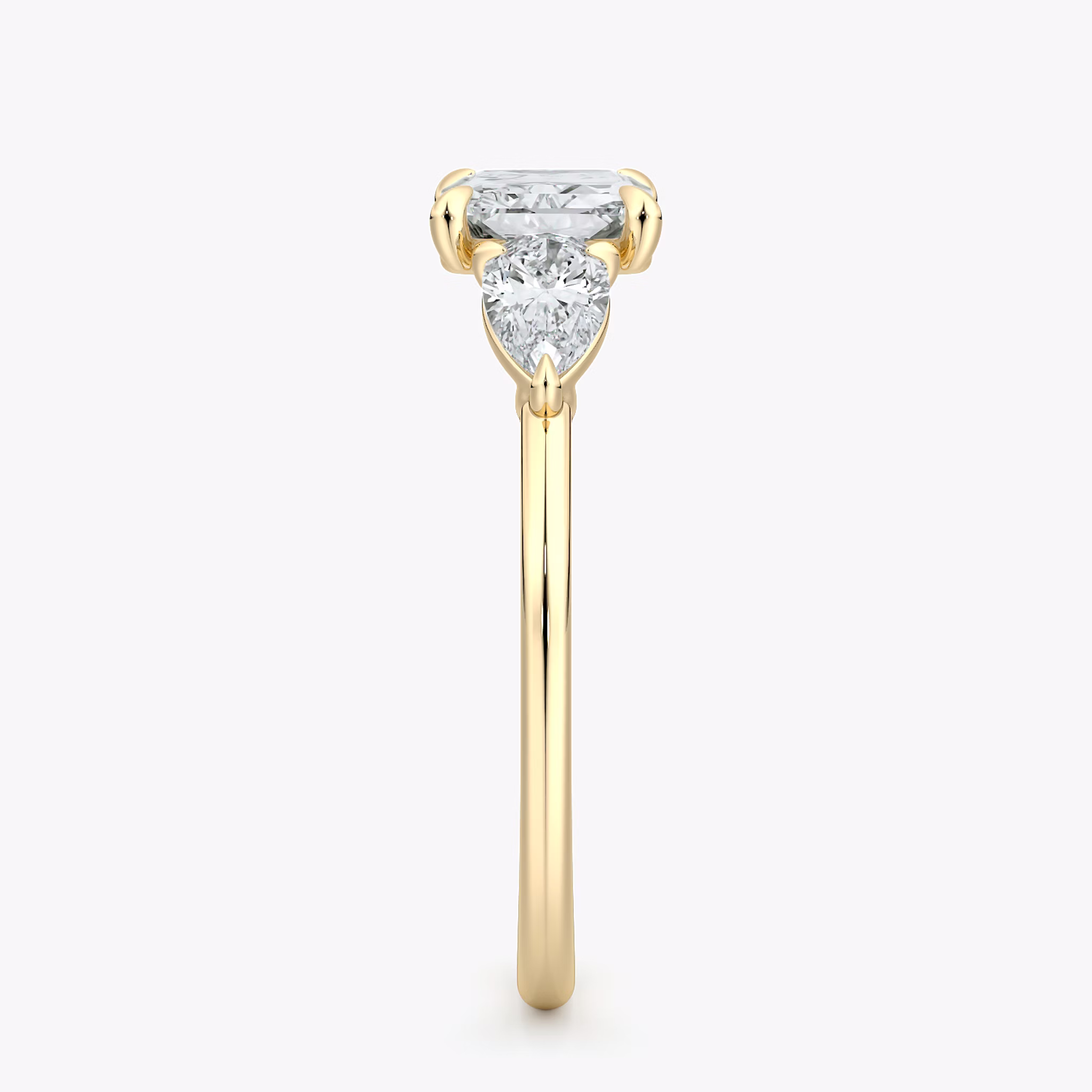 The Three Stone | Radiant | 18k | Yellow Gold | bandAccent: Plain | diamondOrientation: horizontal | sideStoneCarat: 0.25ct | sideStoneShape: Pear | caratWeight: other
