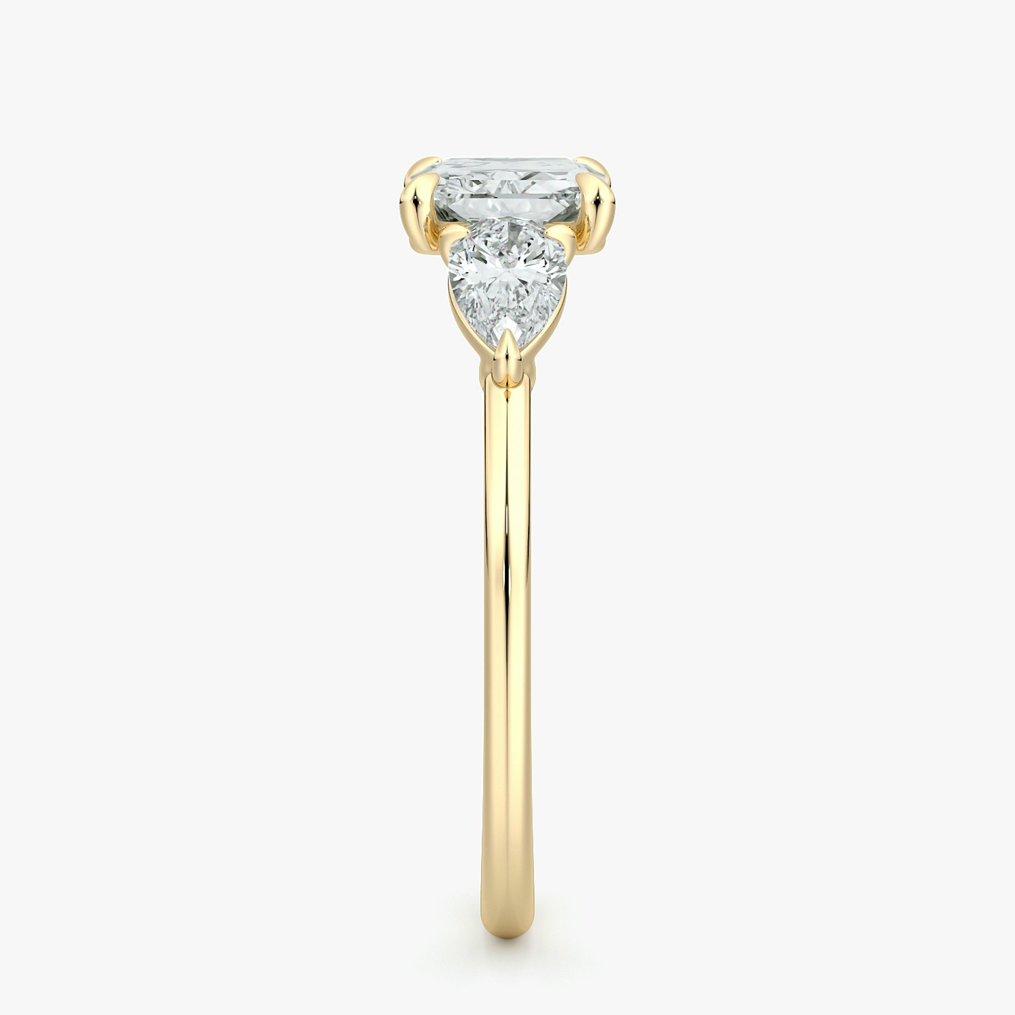 The Three Stone | Radiant | 18k | Yellow Gold | bandAccent: Plain | diamondOrientation: horizontal | sideStoneCarat: 0.25ct | sideStoneShape: Pear | caratWeight: other