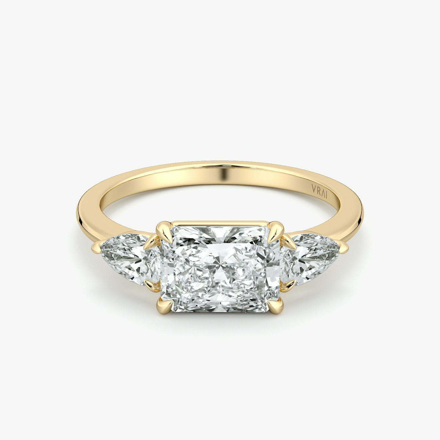 The Three Stone | Radiant | 18k | Yellow Gold | bandAccent: Plain | diamondOrientation: horizontal | sideStoneCarat: 0.25ct | sideStoneShape: Pear | caratWeight: other