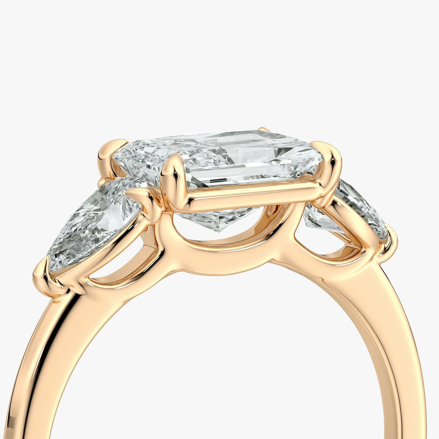 The Three Stone | Radiant | 14k | Rose Gold | bandAccent: Plain | diamondOrientation: horizontal | sideStoneCarat: 0.25ct | sideStoneShape: Pear | caratWeight: other