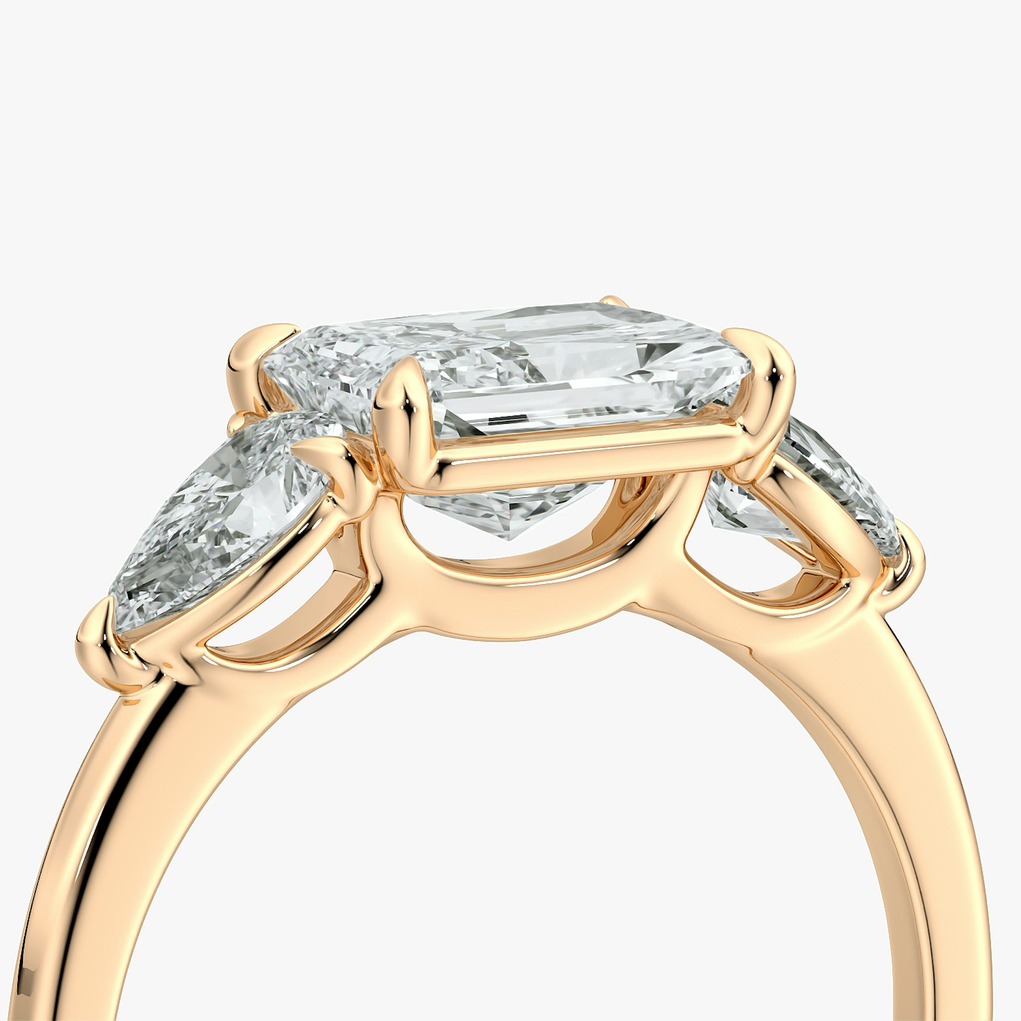 The Three Stone | Radiant | 14k | Rose Gold | bandAccent: Plain | diamondOrientation: horizontal | sideStoneCarat: 0.25ct | sideStoneShape: Pear | caratWeight: other