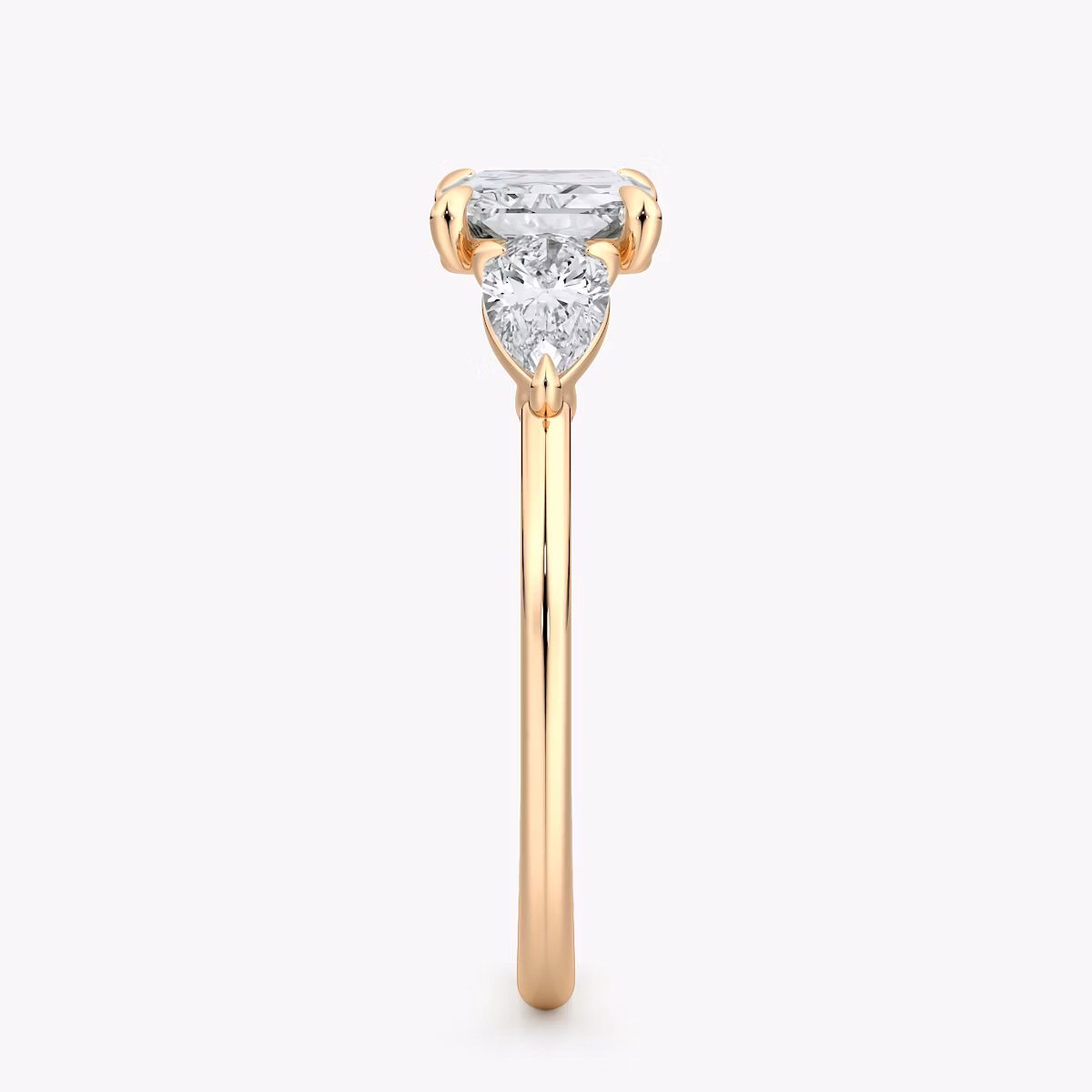 The Three Stone | Radiant | 14k | Rose Gold | bandAccent: Plain | diamondOrientation: horizontal | sideStoneCarat: 0.25ct | sideStoneShape: Pear | caratWeight: other