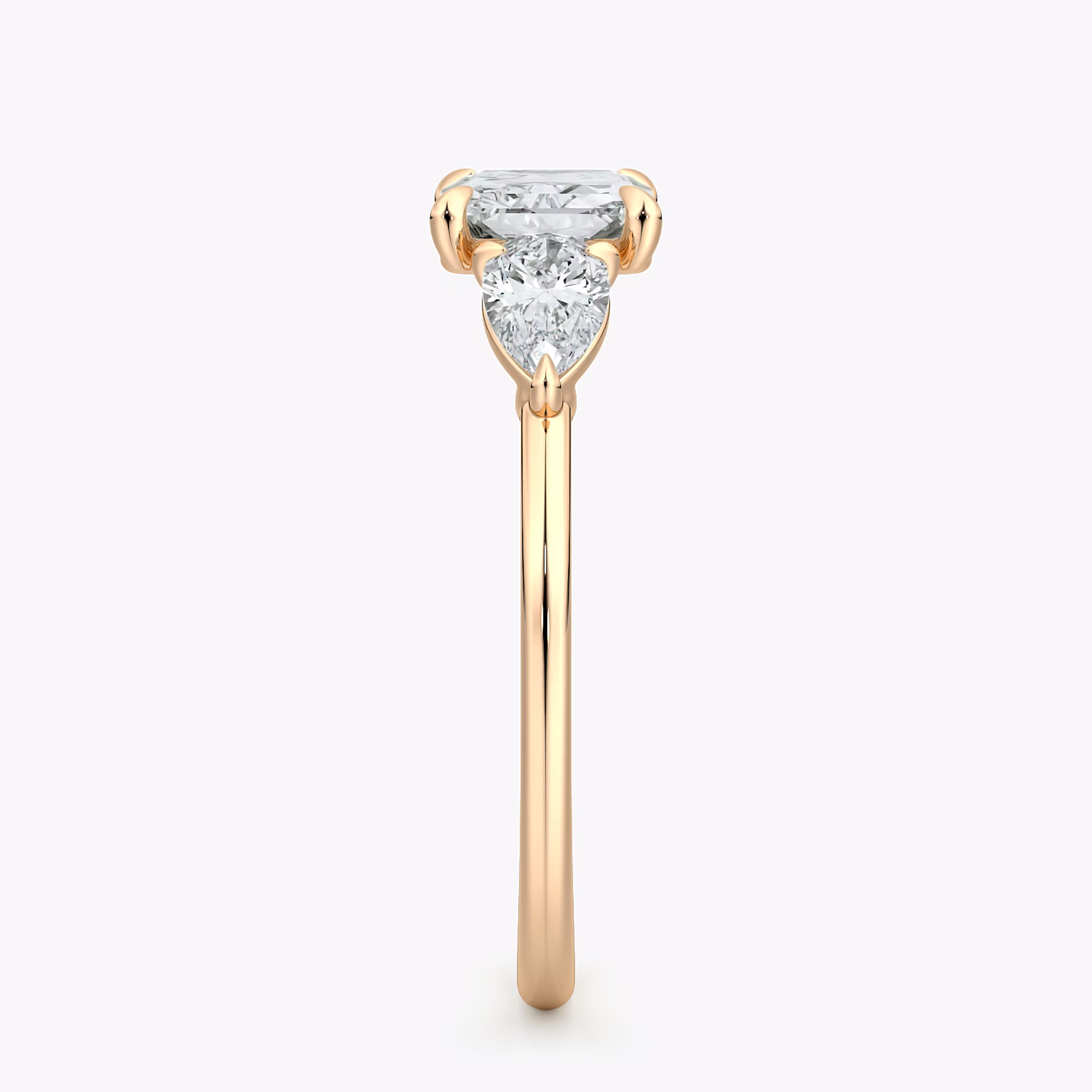 The Three Stone | Radiant | 14k | Rose Gold | bandAccent: Plain | diamondOrientation: horizontal | sideStoneCarat: 0.25ct | sideStoneShape: Pear | caratWeight: other