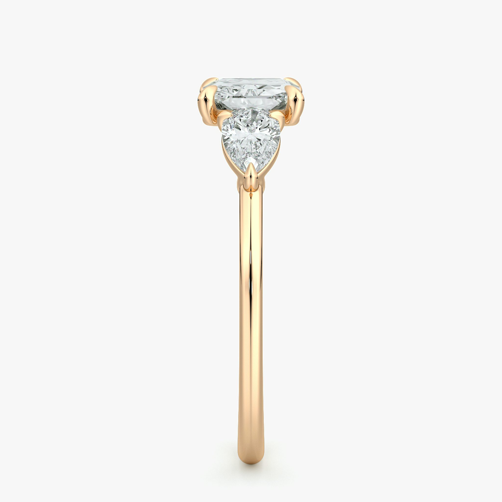 The Three Stone | Radiant | 14k | Rose Gold | bandAccent: Plain | diamondOrientation: horizontal | sideStoneCarat: 0.25ct | sideStoneShape: Pear | caratWeight: other