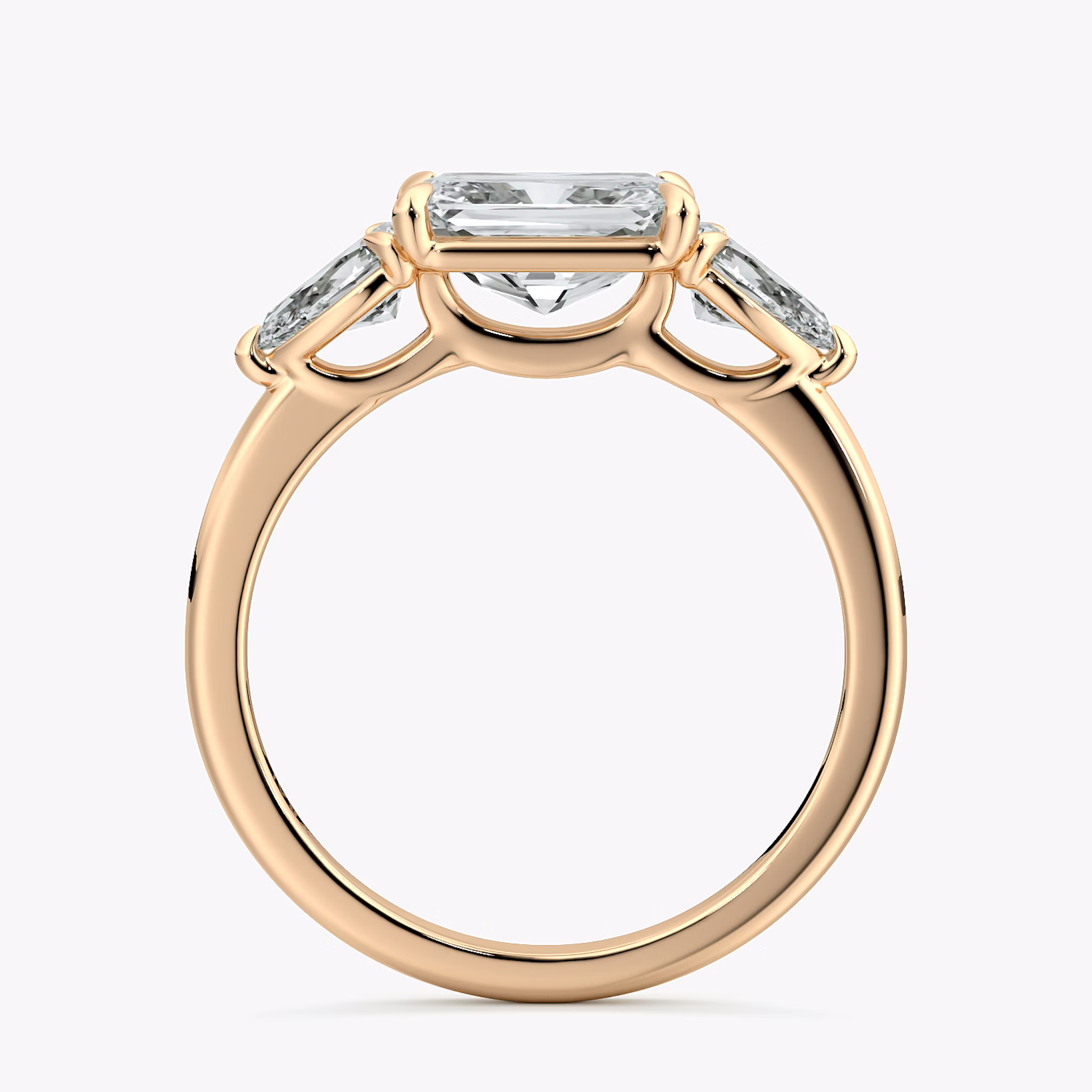 The Three Stone | Radiant | 14k | Rose Gold | bandAccent: Plain | diamondOrientation: horizontal | sideStoneCarat: 0.25ct | sideStoneShape: Pear | caratWeight: other