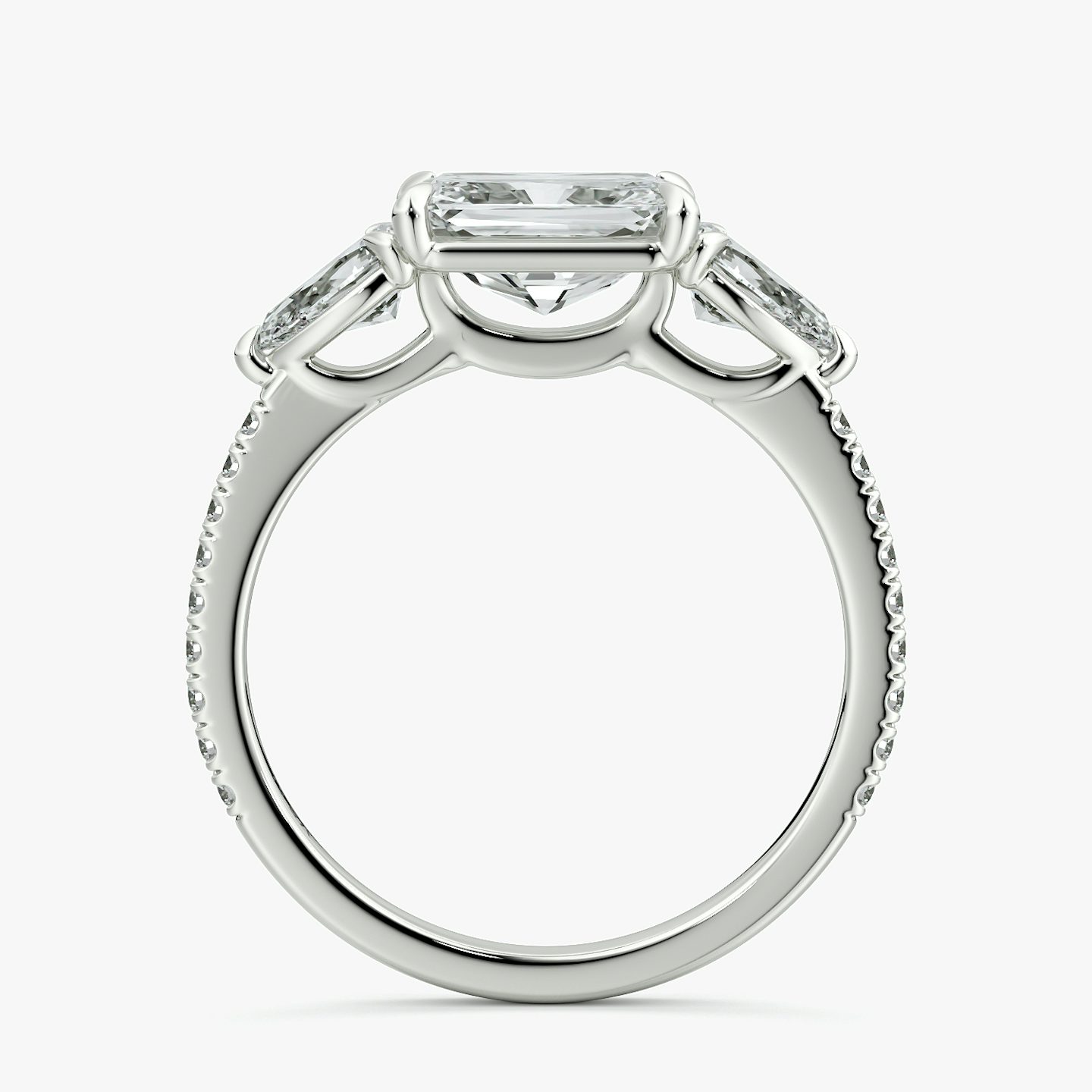 The Three Stone | Radiant | 18k | White Gold | bandAccent: Pavé | diamondOrientation: horizontal | sideStoneCarat: 0.25ct | sideStoneShape: Pear | caratWeight: other