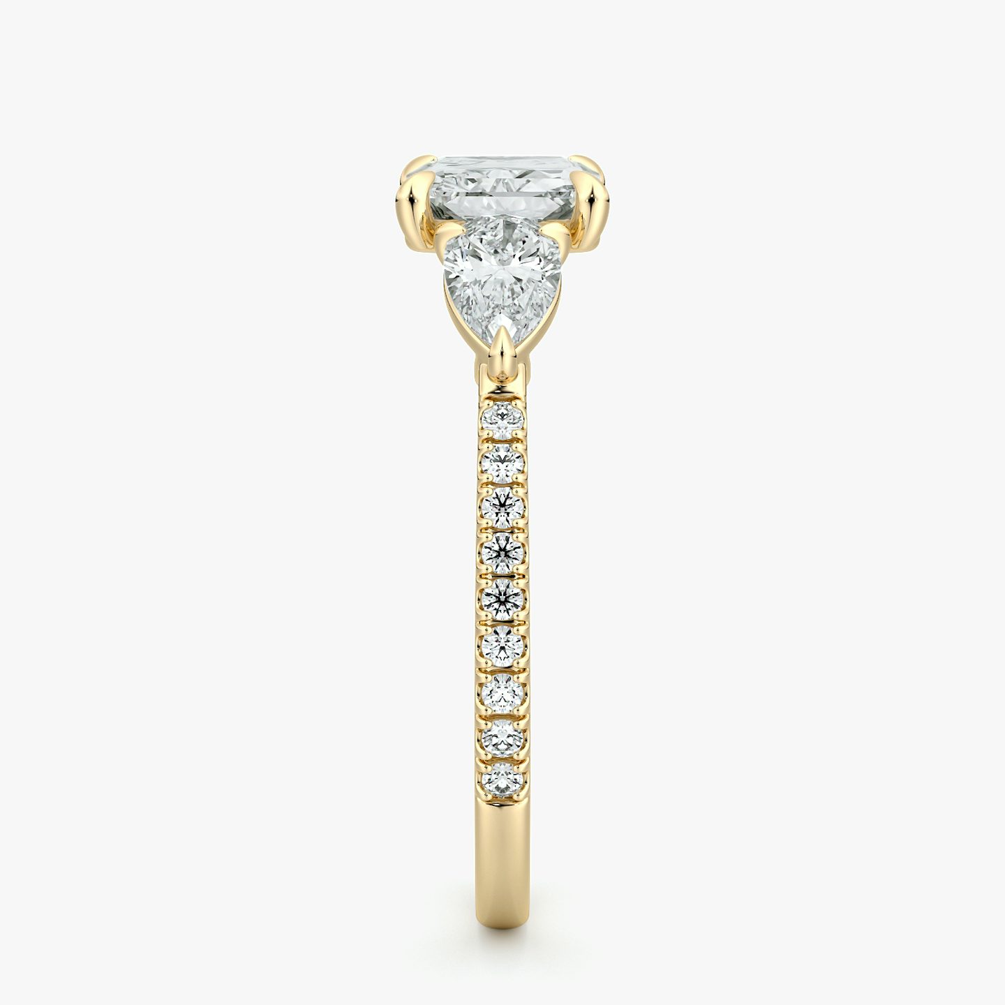 The Three Stone | Radiant | 18k | Yellow Gold | bandAccent: Pavé | diamondOrientation: horizontal | sideStoneCarat: 0.25ct | sideStoneShape: Pear | caratWeight: other