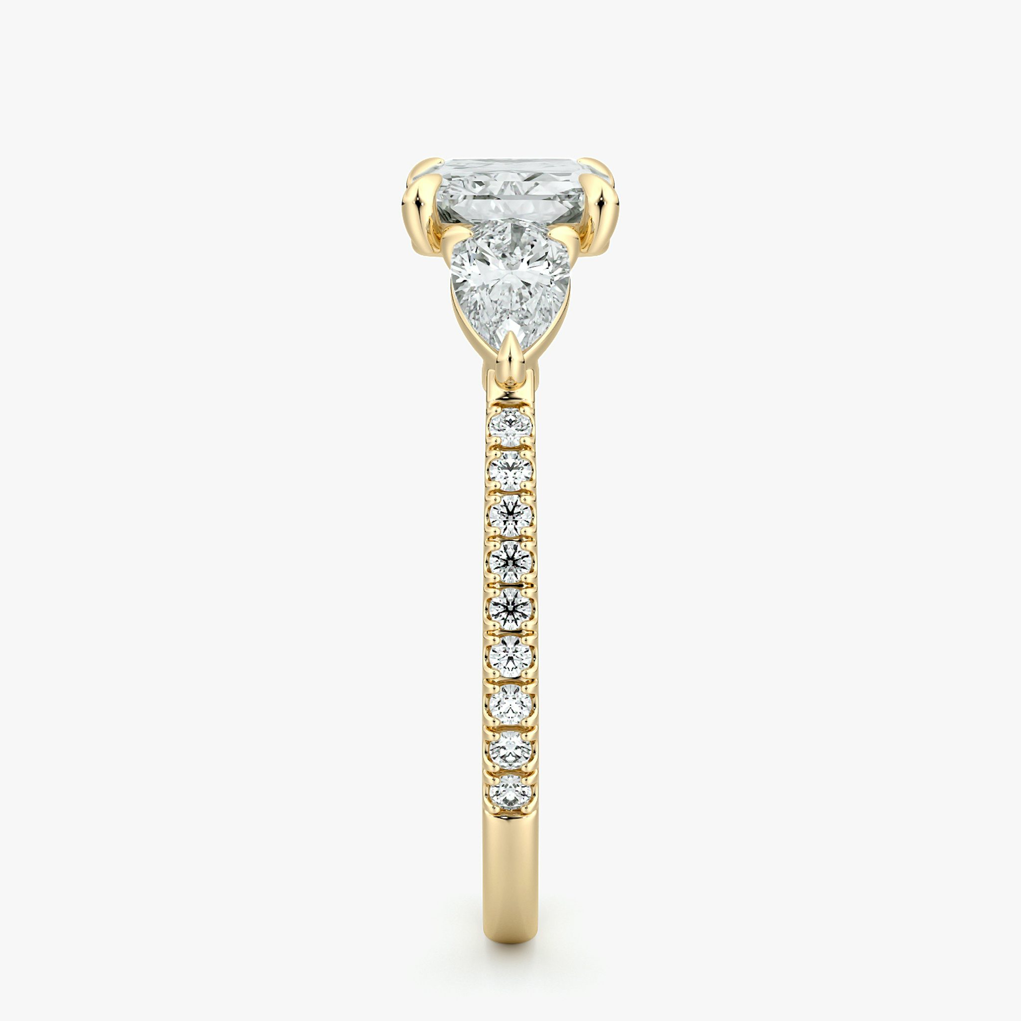 The Three Stone | Radiant | 18k | Yellow Gold | bandAccent: Pavé | diamondOrientation: horizontal | sideStoneCarat: 0.25ct | sideStoneShape: Pear | caratWeight: other