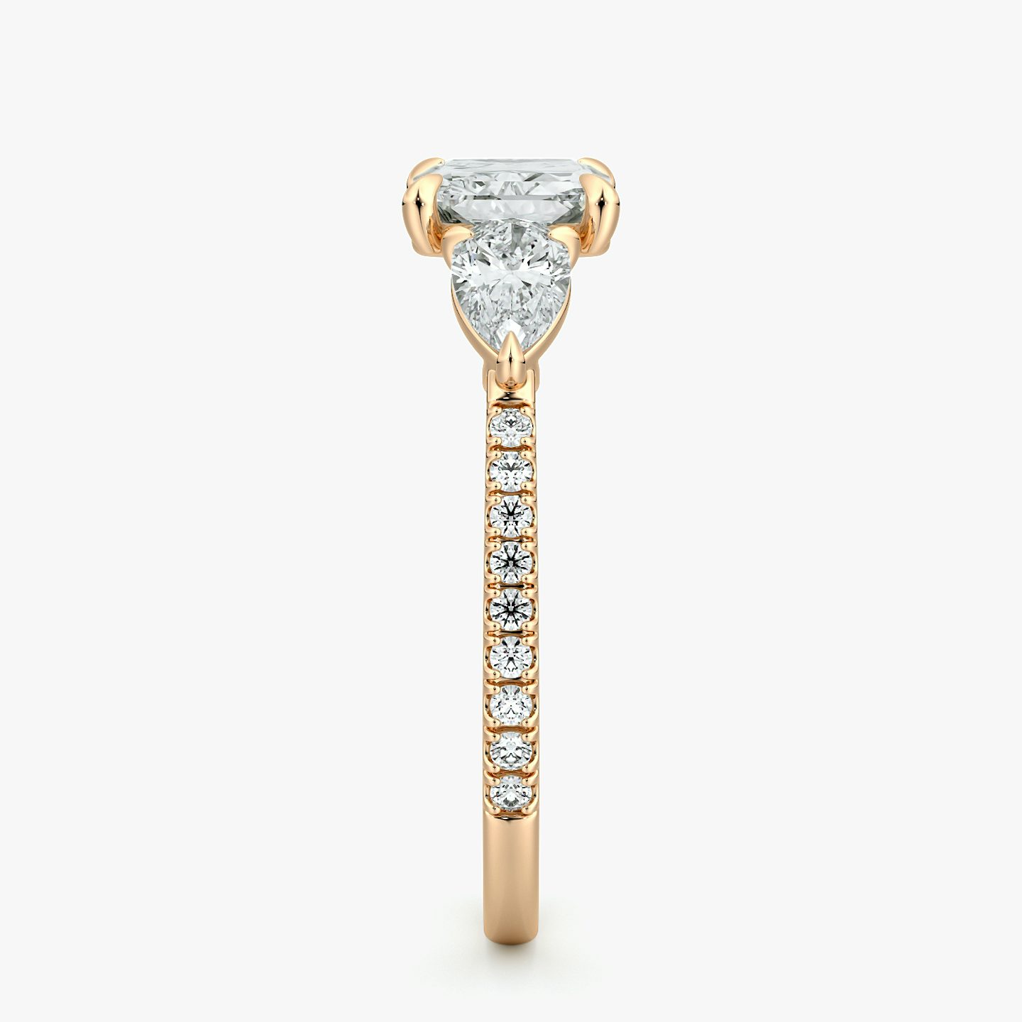 The Three Stone | Radiant | 14k | Rose Gold | bandAccent: Pavé | diamondOrientation: horizontal | sideStoneCarat: 0.25ct | sideStoneShape: Pear | caratWeight: other