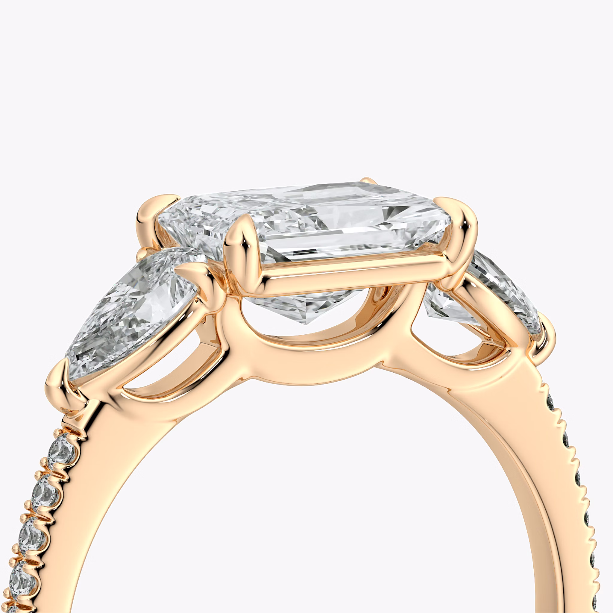The Three Stone | Radiant | 14k | Rose Gold | bandAccent: Pavé | diamondOrientation: horizontal | sideStoneCarat: 0.25ct | sideStoneShape: Pear | caratWeight: other