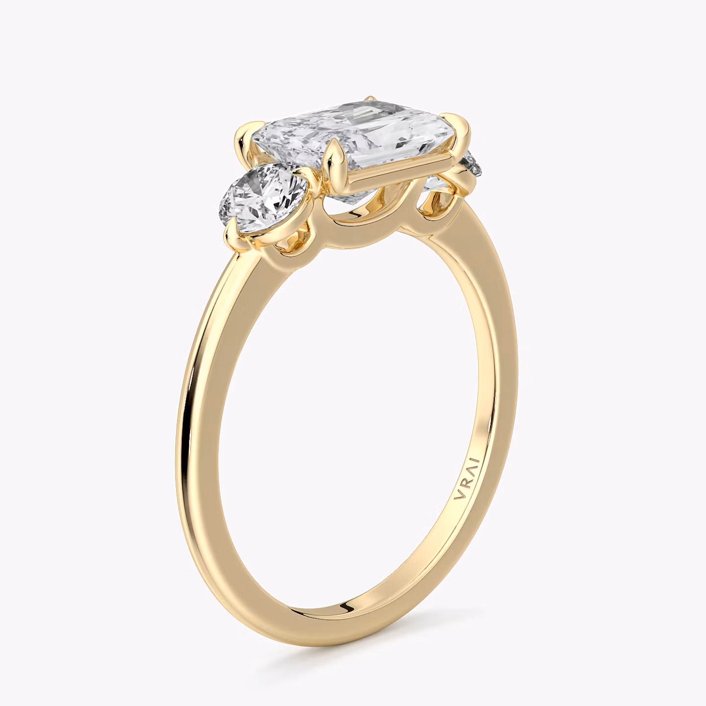 The Three Stone | Radiant | 18k | Yellow Gold | bandAccent: Plain | diamondOrientation: horizontal | sideStoneCarat: 0.25ct | sideStoneShape: Round Brilliant | caratWeight: other