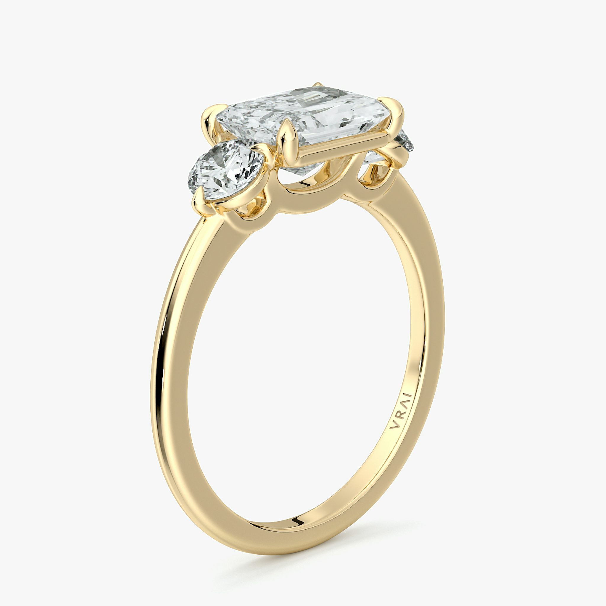 The Three Stone | Radiant | 18k | Yellow Gold | bandAccent: Plain | diamondOrientation: horizontal | sideStoneCarat: 0.25ct | sideStoneShape: Round Brilliant | caratWeight: other
