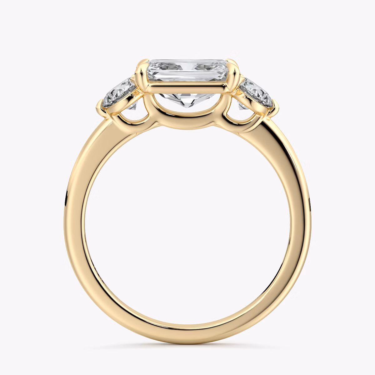 The Three Stone | Radiant | 18k | Yellow Gold | bandAccent: Plain | diamondOrientation: horizontal | sideStoneCarat: 0.25ct | sideStoneShape: Round Brilliant | caratWeight: other