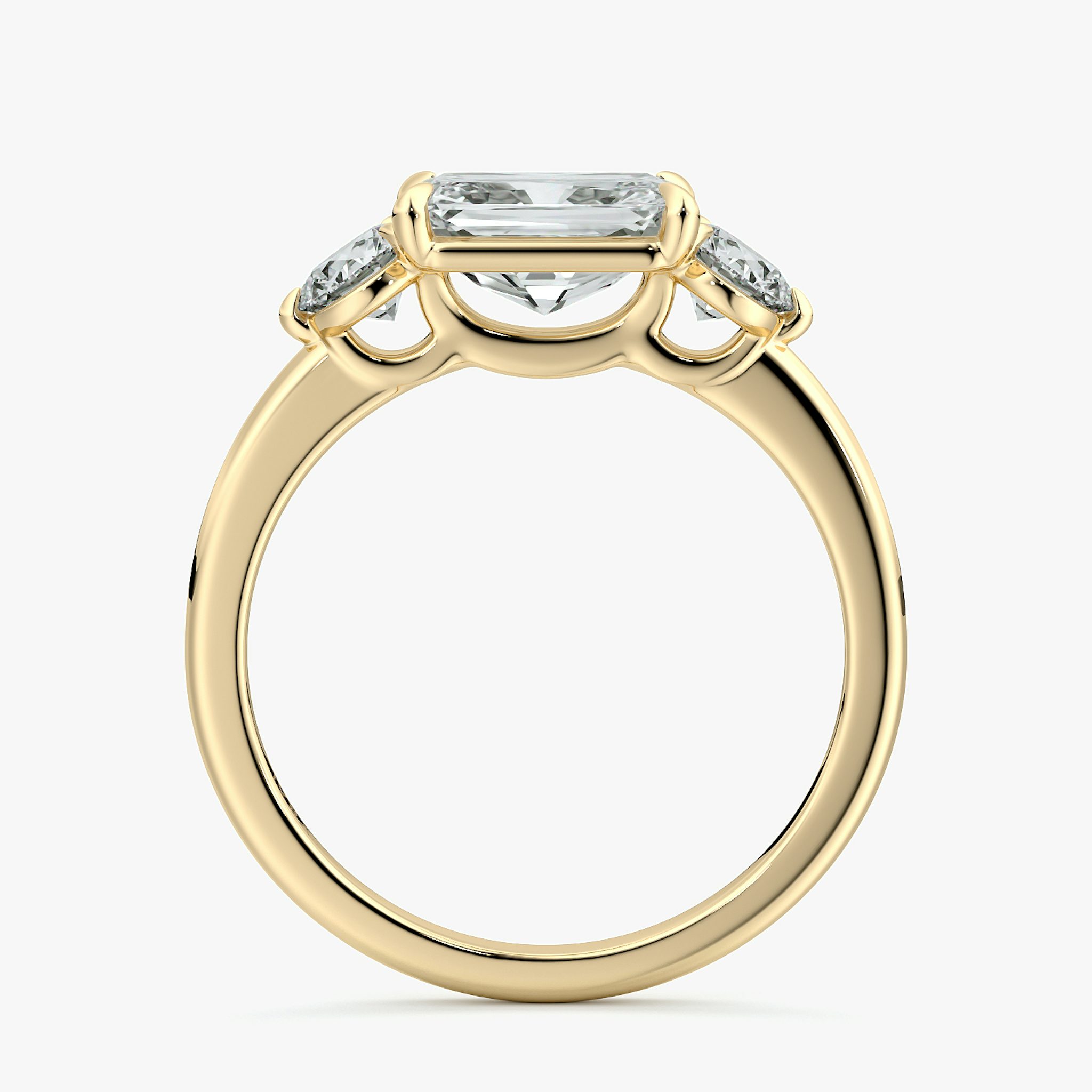 The Three Stone | Radiant | 18k | Yellow Gold | bandAccent: Plain | diamondOrientation: horizontal | sideStoneCarat: 0.25ct | sideStoneShape: Round Brilliant | caratWeight: other