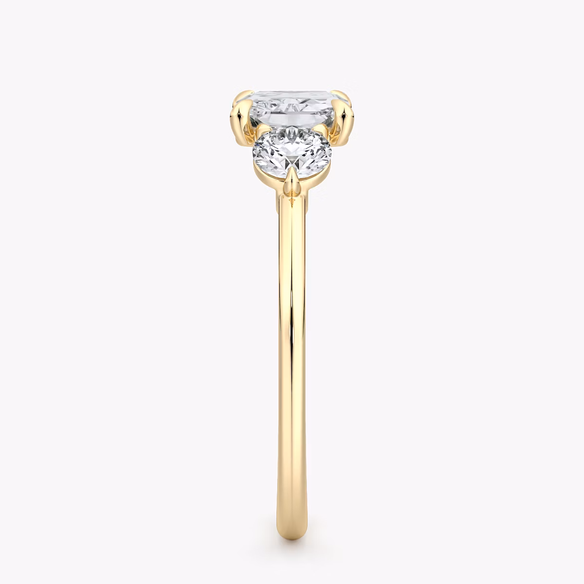 The Three Stone | Radiant | 18k | Yellow Gold | bandAccent: Plain | diamondOrientation: horizontal | sideStoneCarat: 0.25ct | sideStoneShape: Round Brilliant | caratWeight: other