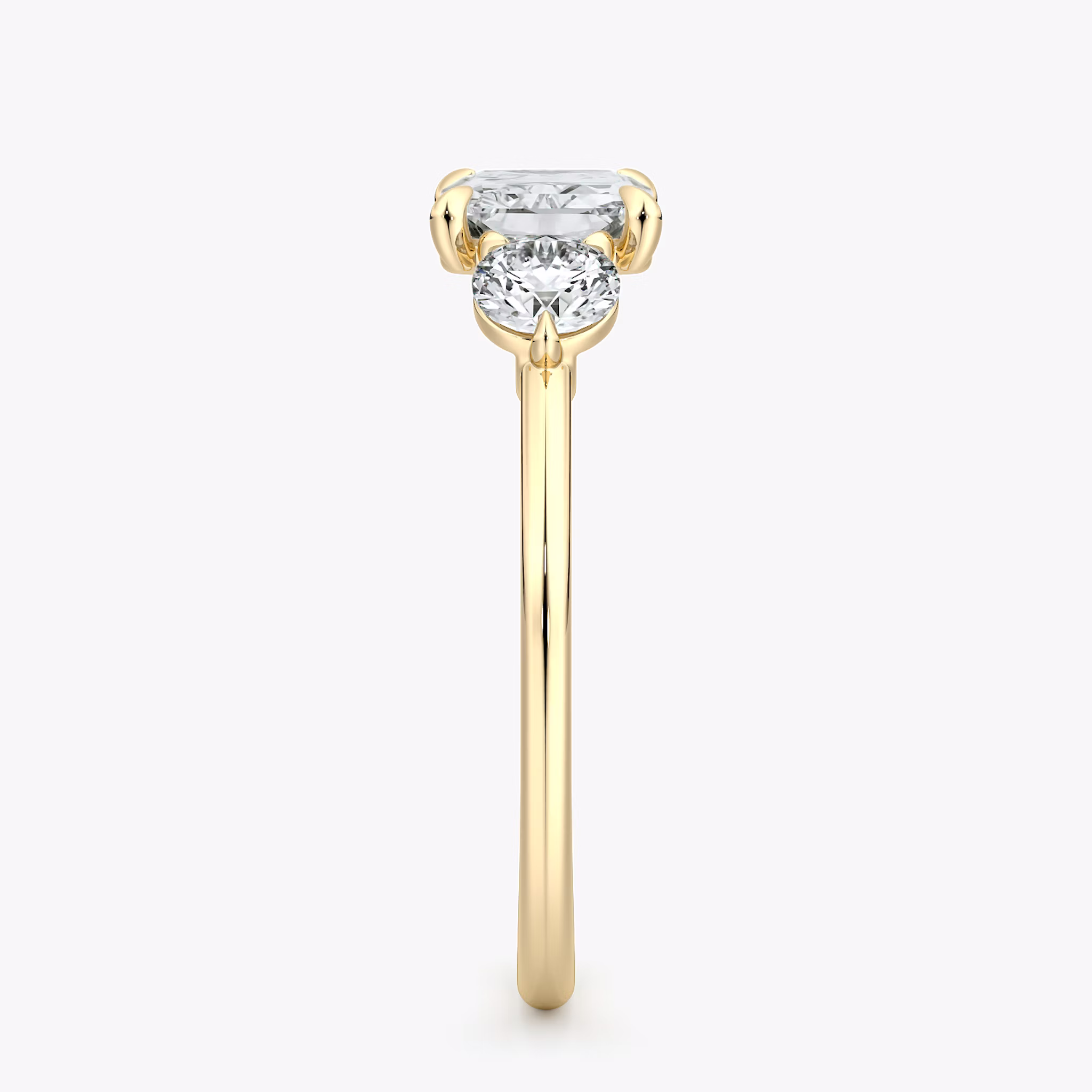 The Three Stone | Radiant | 18k | Yellow Gold | bandAccent: Plain | diamondOrientation: horizontal | sideStoneCarat: 0.25ct | sideStoneShape: Round Brilliant | caratWeight: other