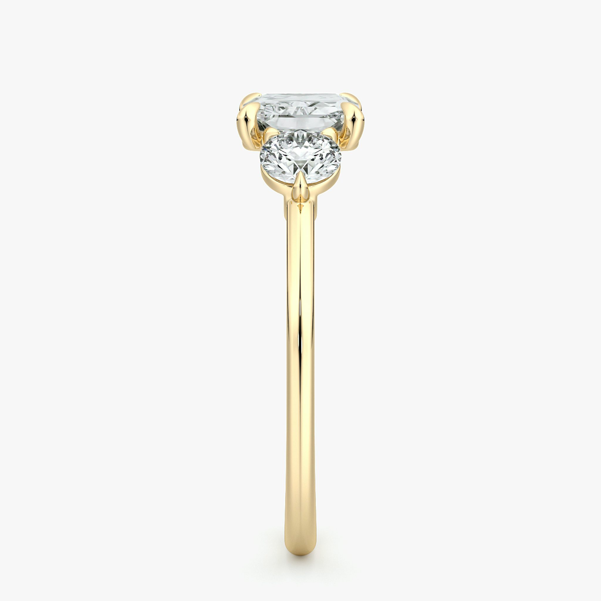 The Three Stone | Radiant | 18k | Yellow Gold | bandAccent: Plain | diamondOrientation: horizontal | sideStoneCarat: 0.25ct | sideStoneShape: Round Brilliant | caratWeight: other