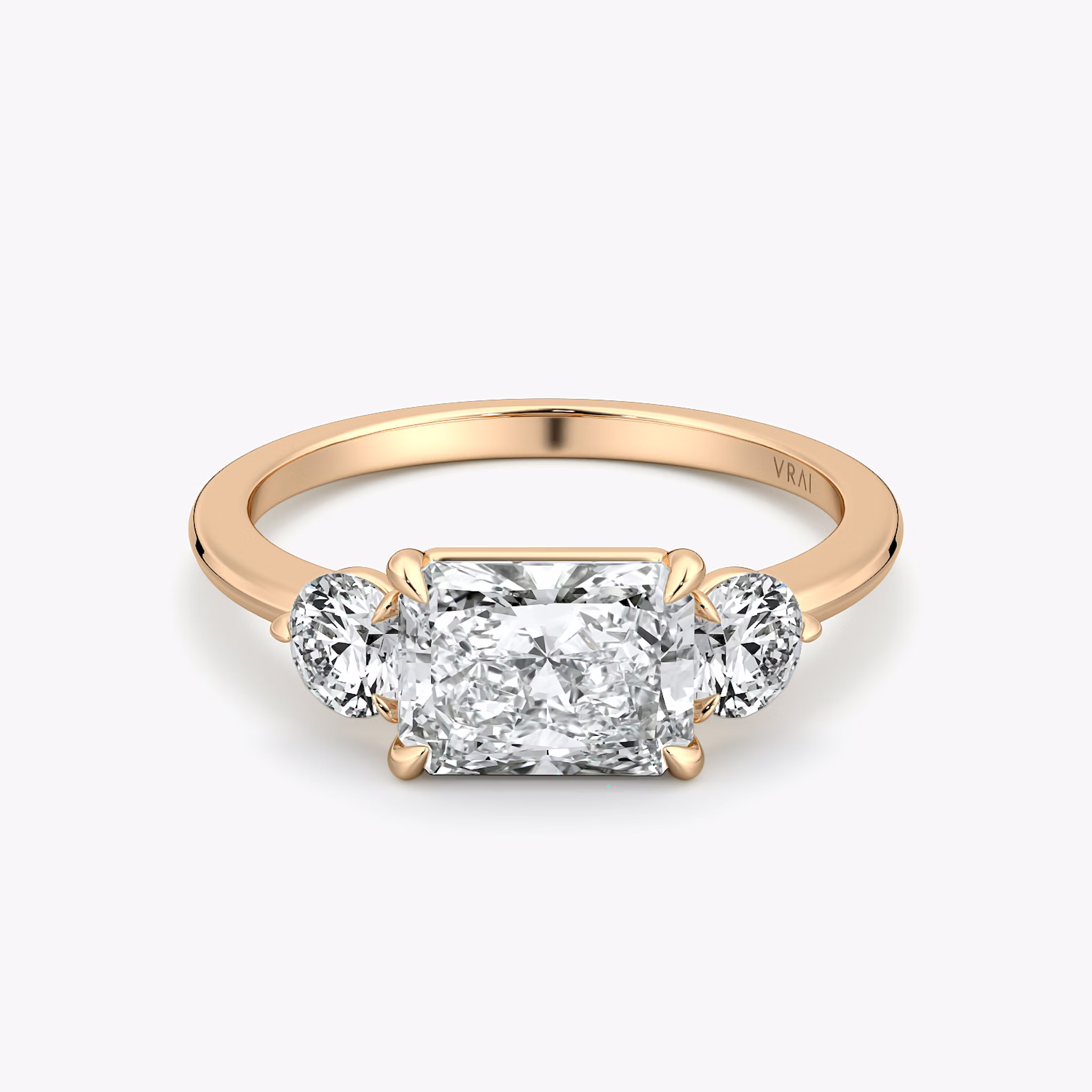 The Three Stone | Radiant | 14k | Rose Gold | bandAccent: Plain | diamondOrientation: horizontal | sideStoneCarat: 0.25ct | sideStoneShape: Round Brilliant | caratWeight: other