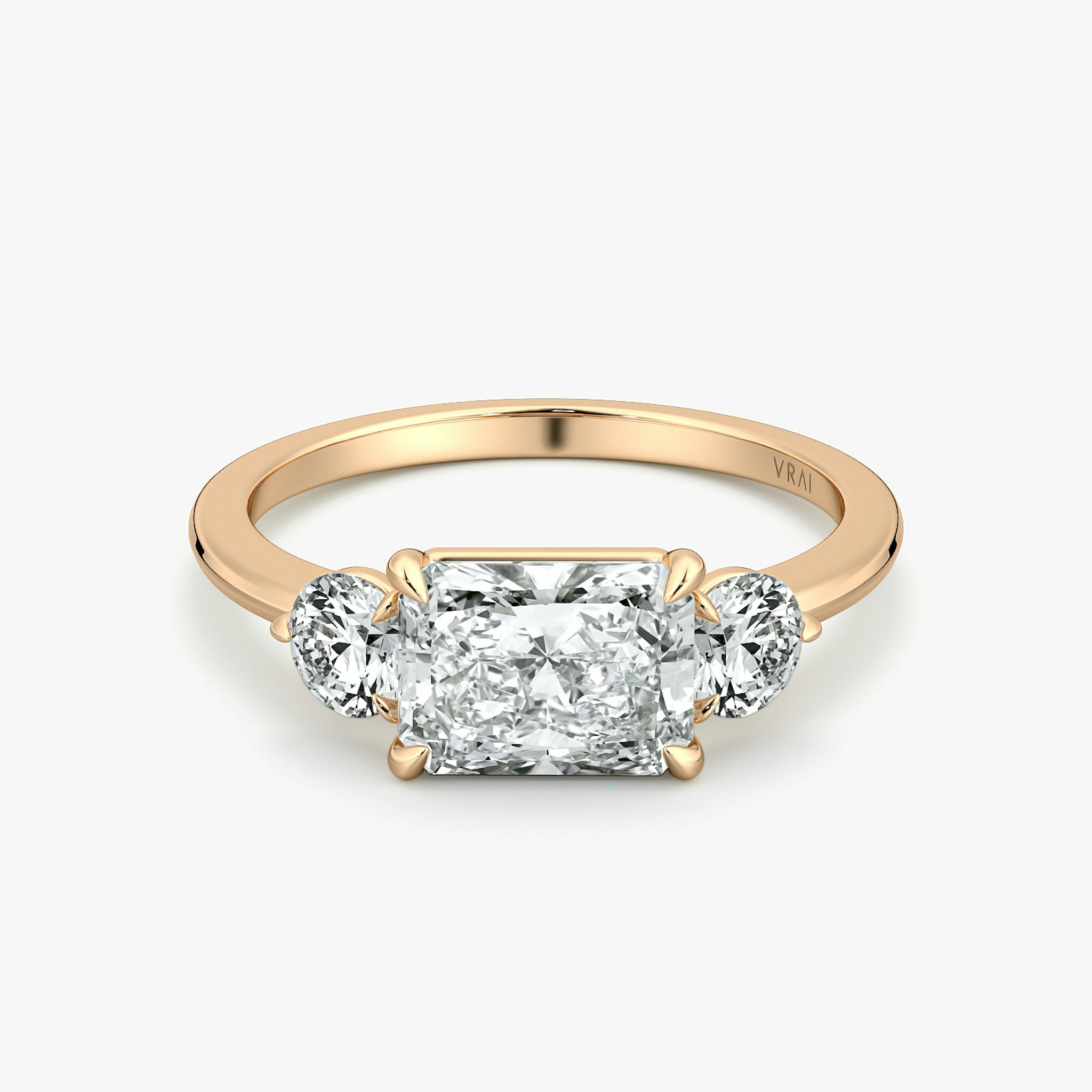 The Three Stone | Radiant | 14k | Rose Gold | bandAccent: Plain | diamondOrientation: horizontal | sideStoneCarat: 0.25ct | sideStoneShape: Round Brilliant | caratWeight: other
