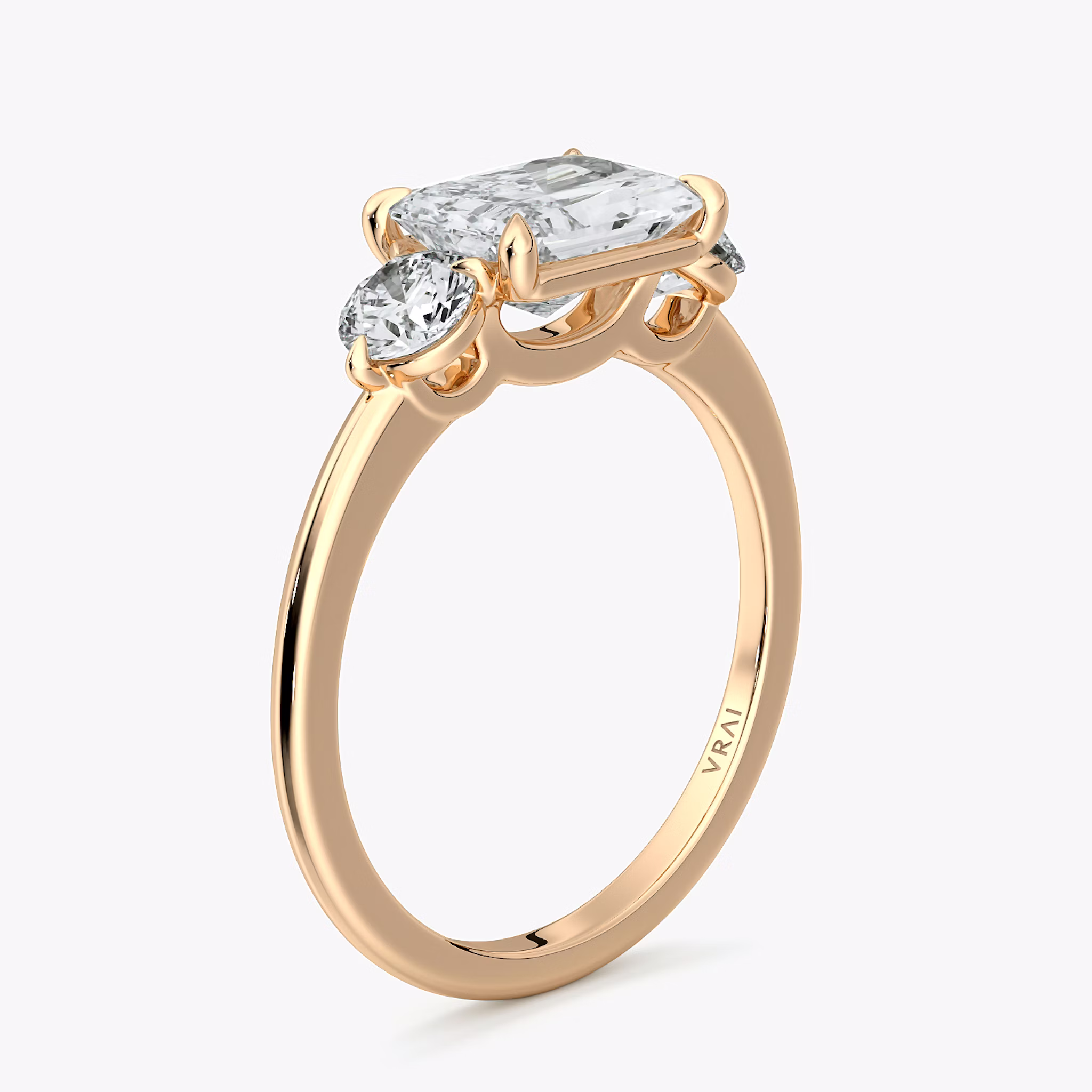 The Three Stone | Radiant | 14k | Rose Gold | bandAccent: Plain | diamondOrientation: horizontal | sideStoneCarat: 0.25ct | sideStoneShape: Round Brilliant | caratWeight: other
