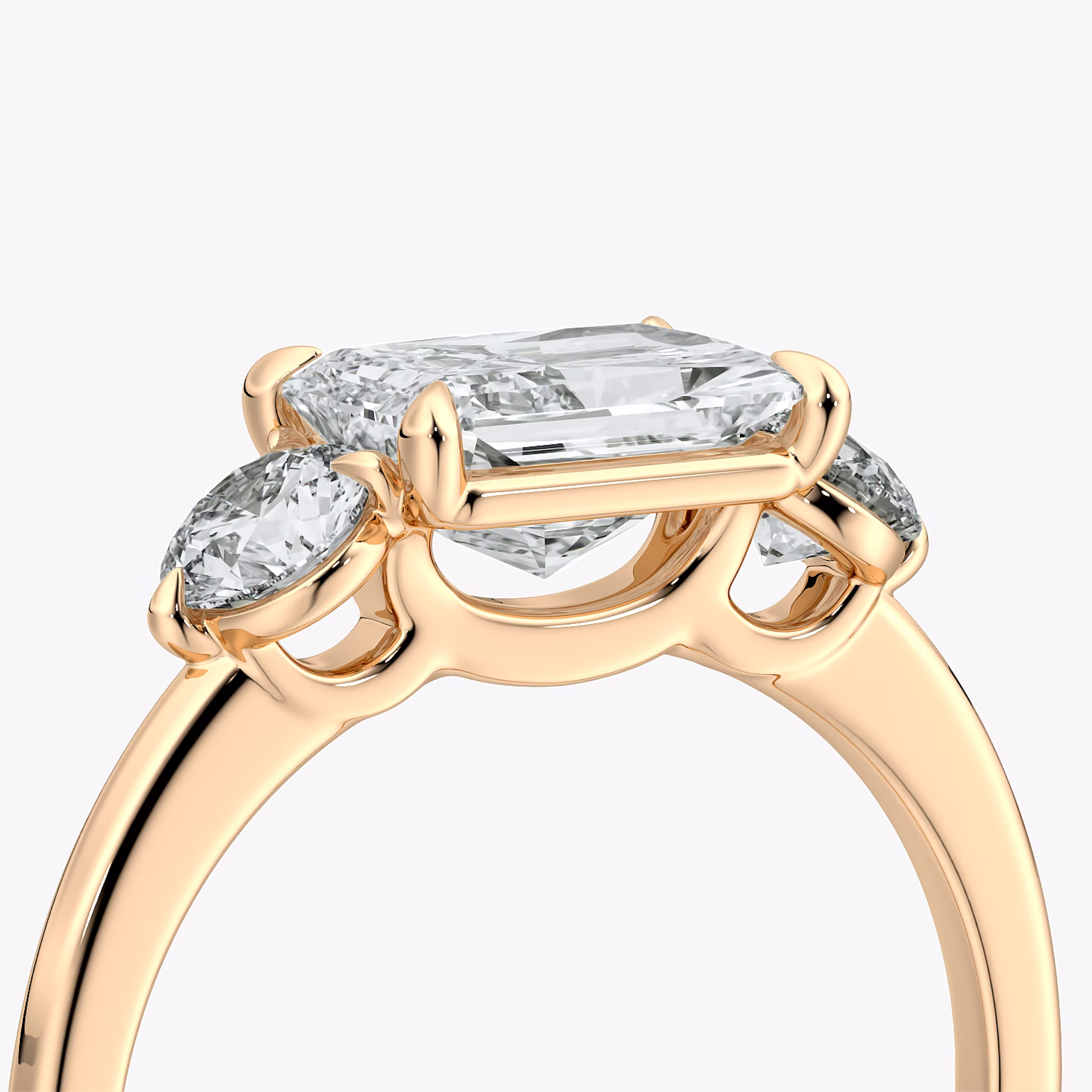 The Three Stone | Radiant | 14k | Rose Gold | bandAccent: Plain | diamondOrientation: horizontal | sideStoneCarat: 0.25ct | sideStoneShape: Round Brilliant | caratWeight: other
