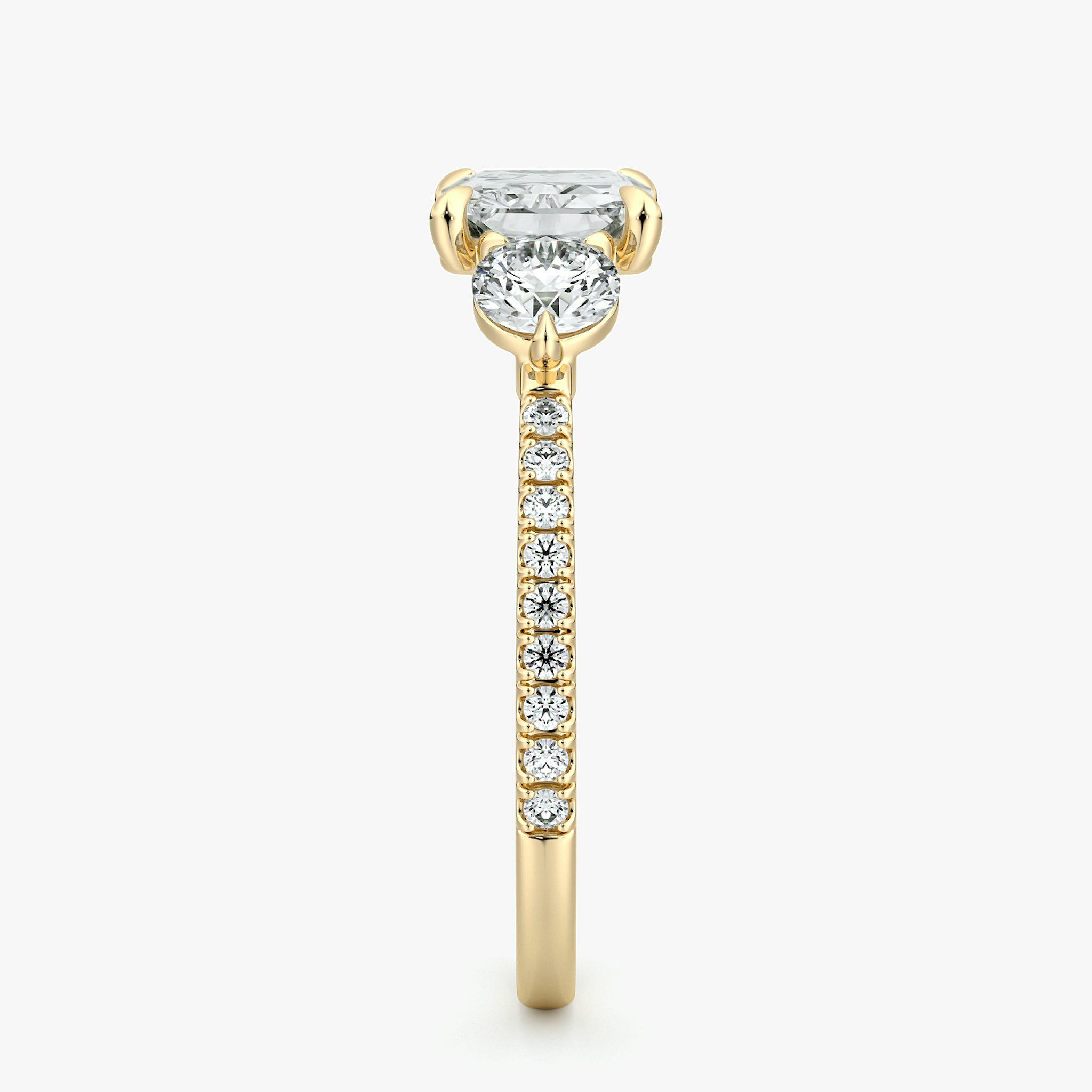 The Three Stone | Radiant | 18k | Yellow Gold | bandAccent: Pavé | diamondOrientation: horizontal | sideStoneCarat: 0.25ct | sideStoneShape: Round Brilliant | caratWeight: other
