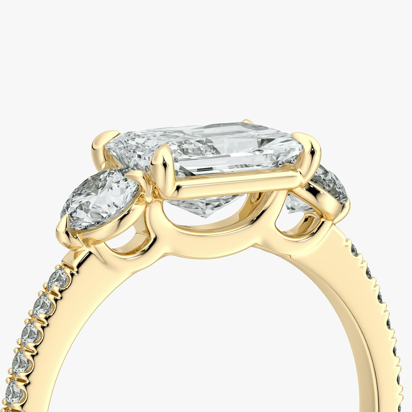 The Three Stone | Radiant | 18k | Yellow Gold | bandAccent: Pavé | diamondOrientation: horizontal | sideStoneCarat: 0.25ct | sideStoneShape: Round Brilliant | caratWeight: other