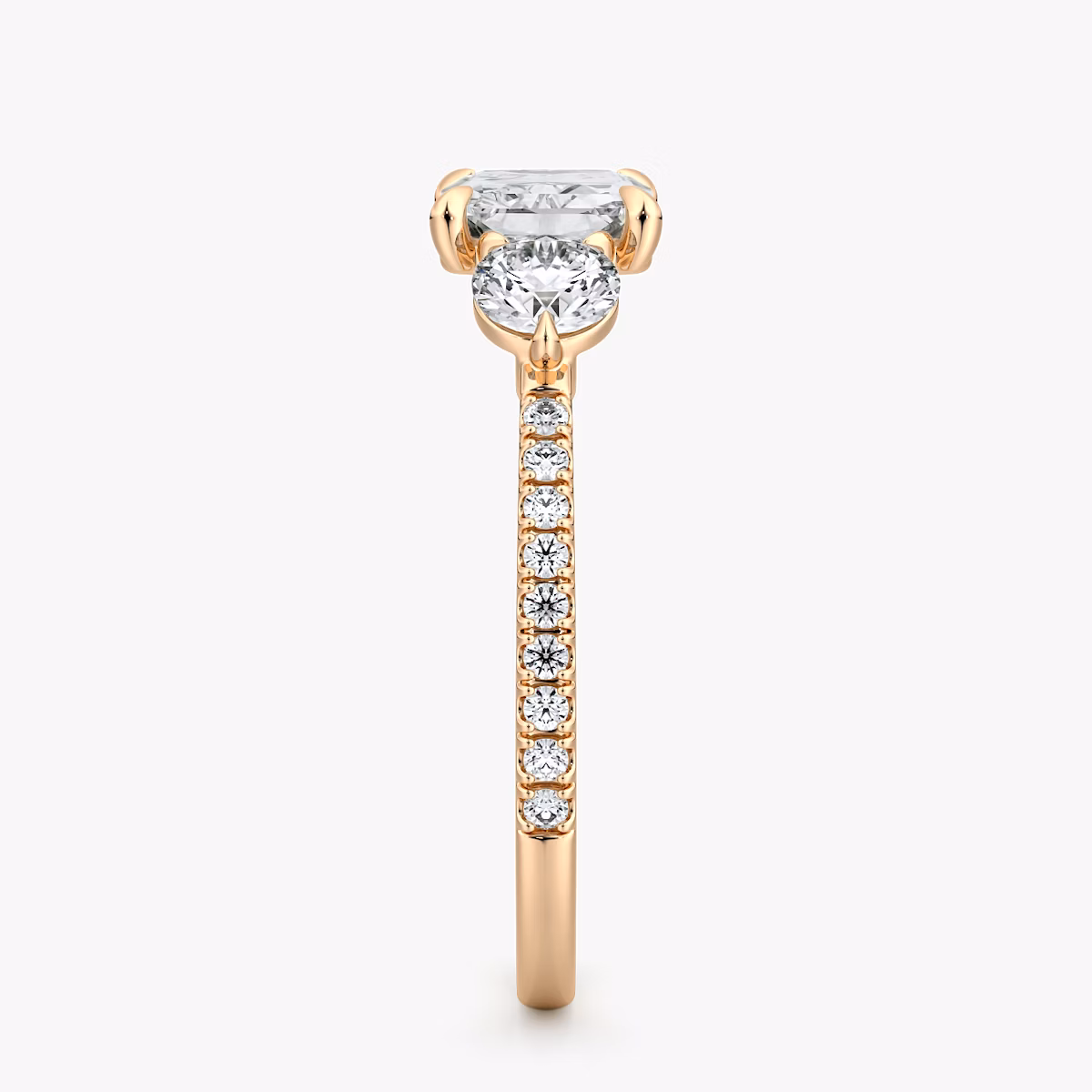 The Three Stone | Radiant | 14k | Rose Gold | bandAccent: Pavé | diamondOrientation: horizontal | sideStoneCarat: 0.25ct | sideStoneShape: Round Brilliant | caratWeight: other