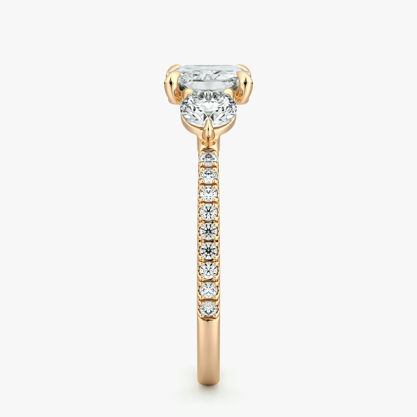 The Three Stone | Radiant | 14k | Rose Gold | bandAccent: Pavé | diamondOrientation: horizontal | sideStoneCarat: 0.25ct | sideStoneShape: Round Brilliant | caratWeight: other