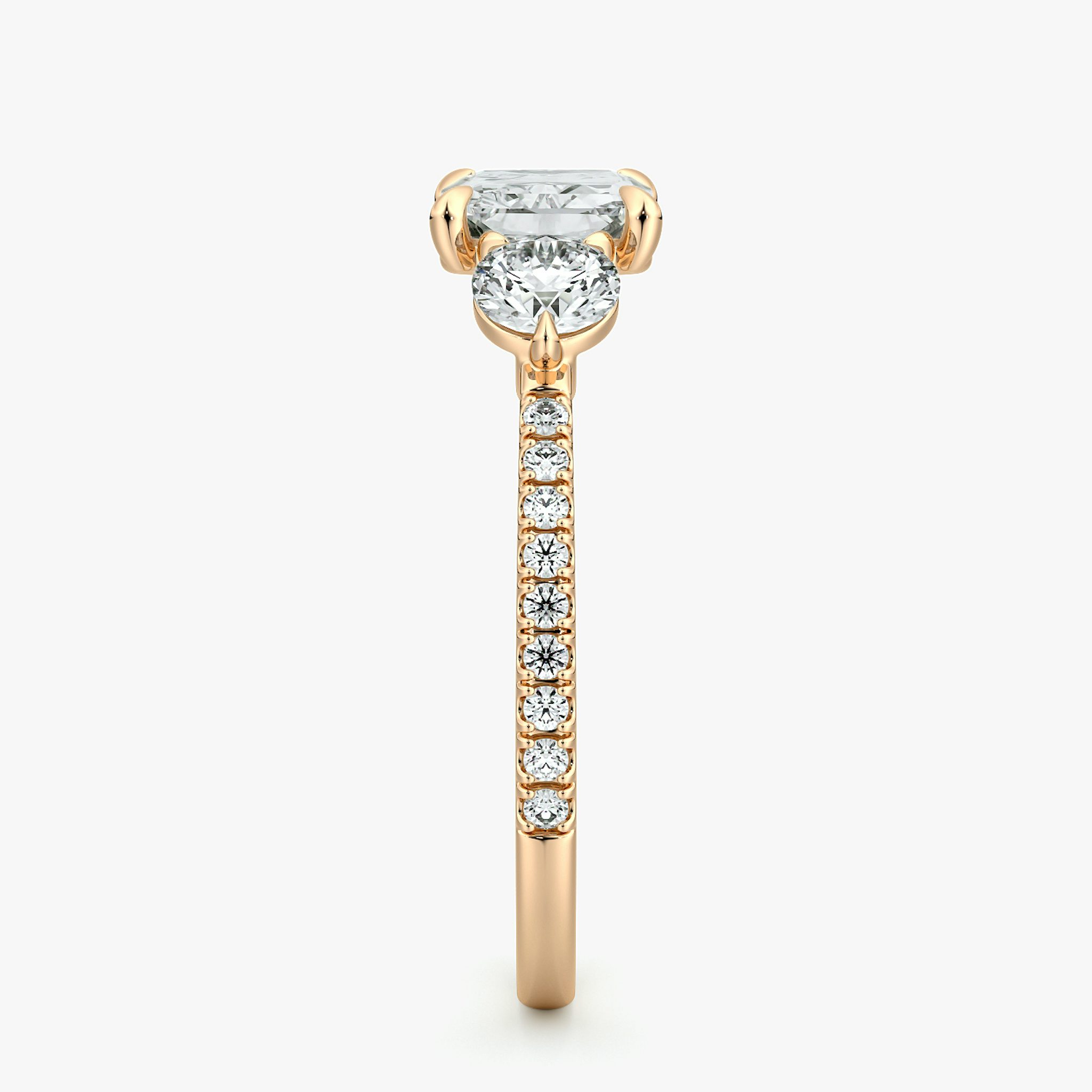 The Three Stone | Radiant | 14k | Rose Gold | bandAccent: Pavé | diamondOrientation: horizontal | sideStoneCarat: 0.25ct | sideStoneShape: Round Brilliant | caratWeight: other