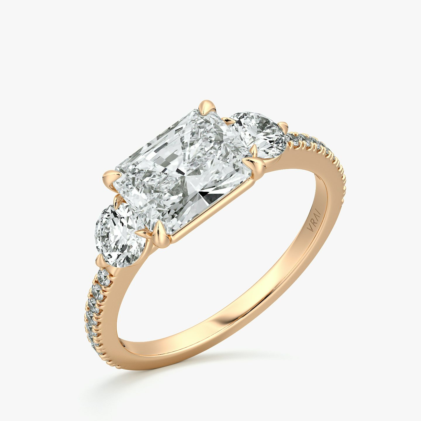 The Three Stone | Radiant | 14k | Rose Gold | bandAccent: Pavé | diamondOrientation: horizontal | sideStoneCarat: 0.25ct | sideStoneShape: Round Brilliant | caratWeight: other
