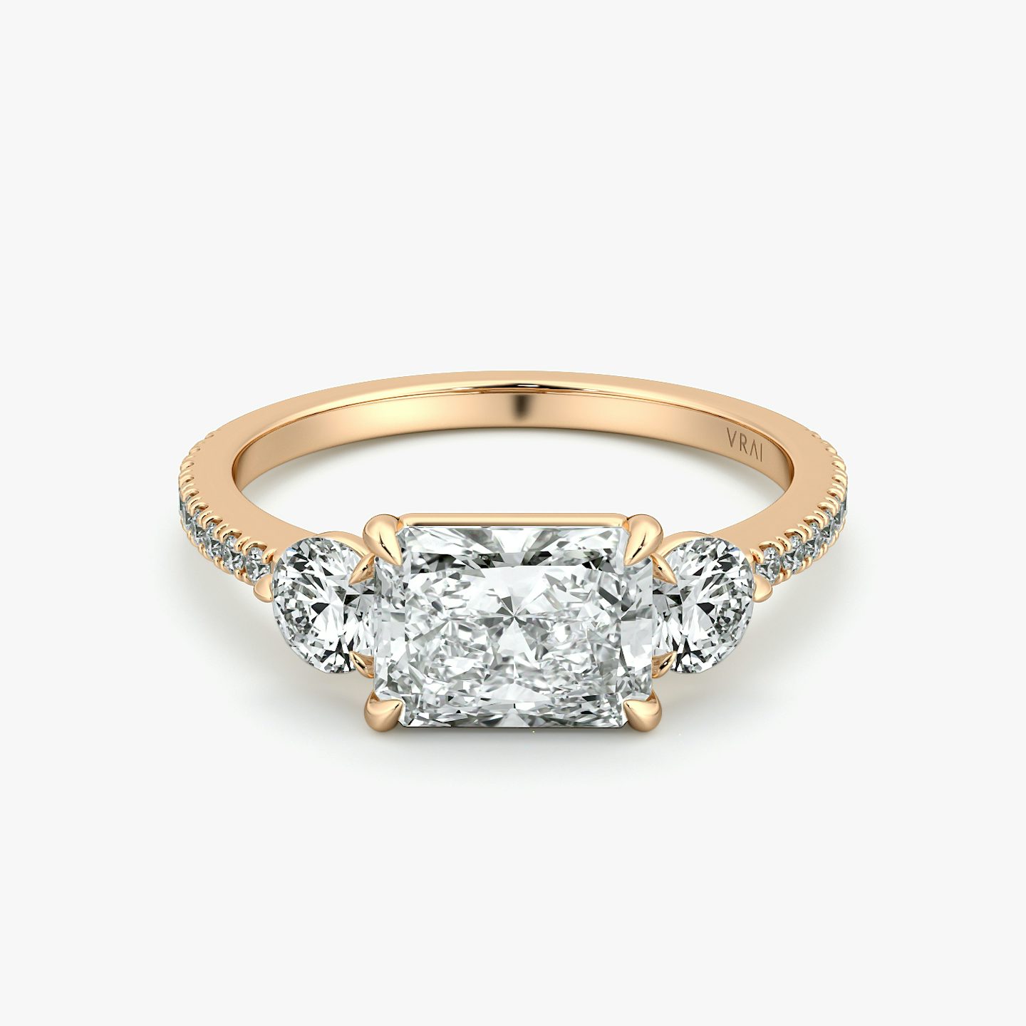 The Three Stone | Radiant | 14k | Rose Gold | bandAccent: Pavé | diamondOrientation: horizontal | sideStoneCarat: 0.25ct | sideStoneShape: Round Brilliant | caratWeight: other