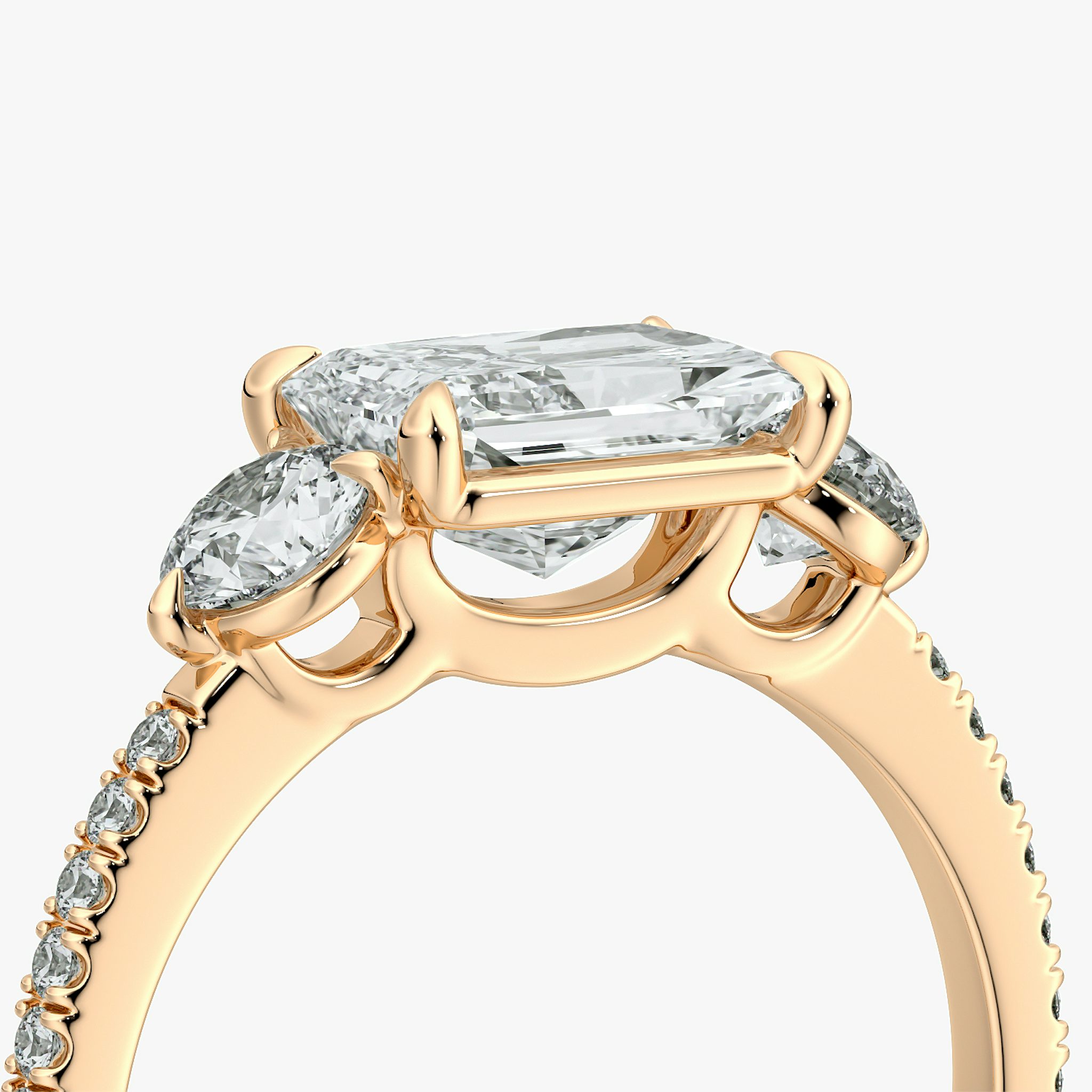 The Three Stone | Radiant | 14k | Rose Gold | bandAccent: Pavé | diamondOrientation: horizontal | sideStoneCarat: 0.25ct | sideStoneShape: Round Brilliant | caratWeight: other