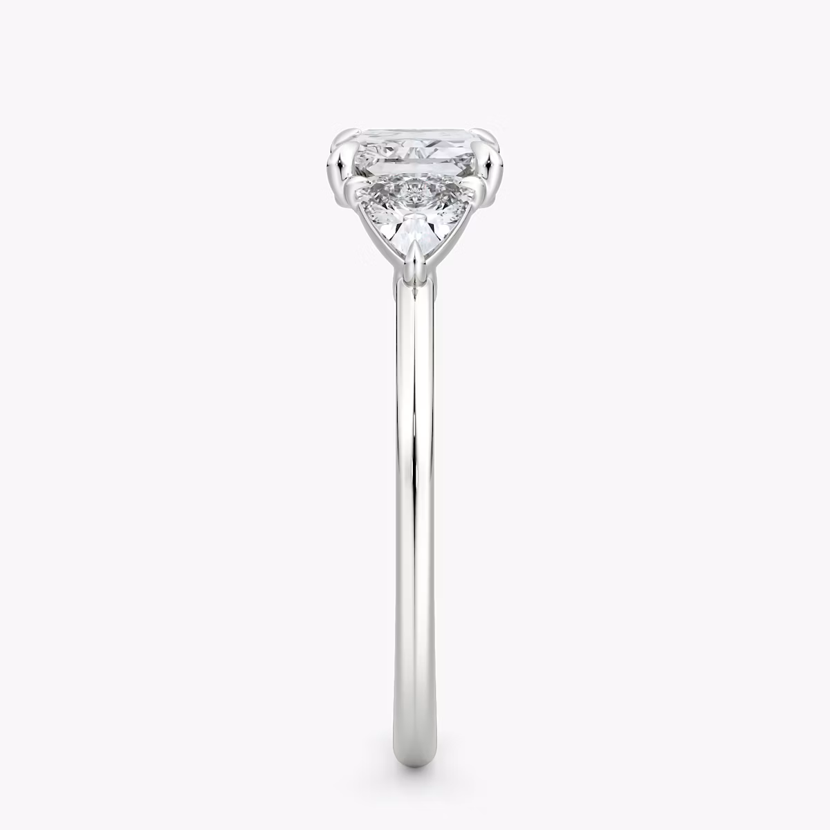The Three Stone | Radiant | 18k | White Gold | bandAccent: Plain | diamondOrientation: horizontal | sideStoneCarat: 0.25ct | sideStoneShape: Trillion | caratWeight: other