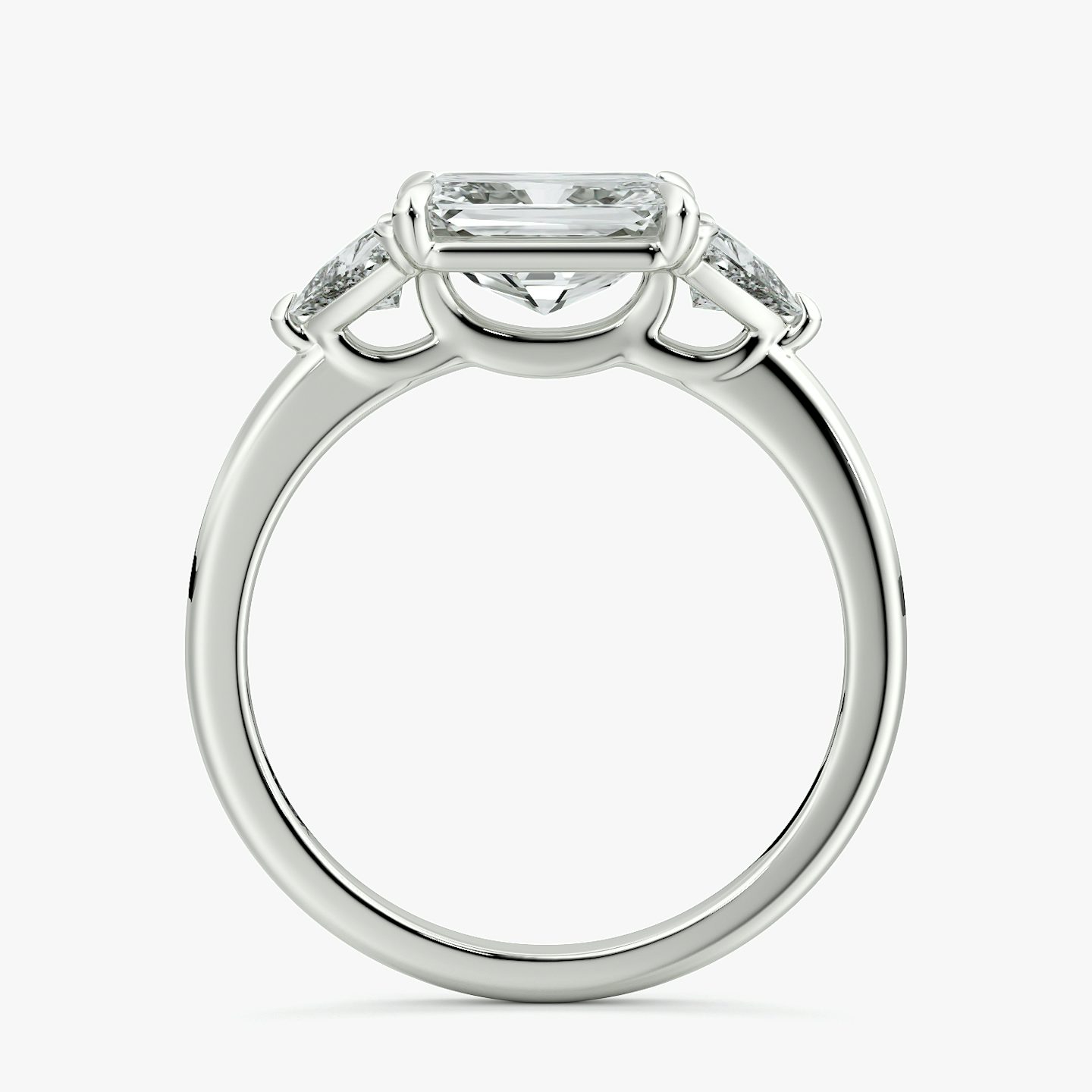 The Three Stone | Radiant | Platinum | bandAccent: Plain | diamondOrientation: horizontal | sideStoneCarat: 0.25ct | sideStoneShape: Trillion | caratWeight: other