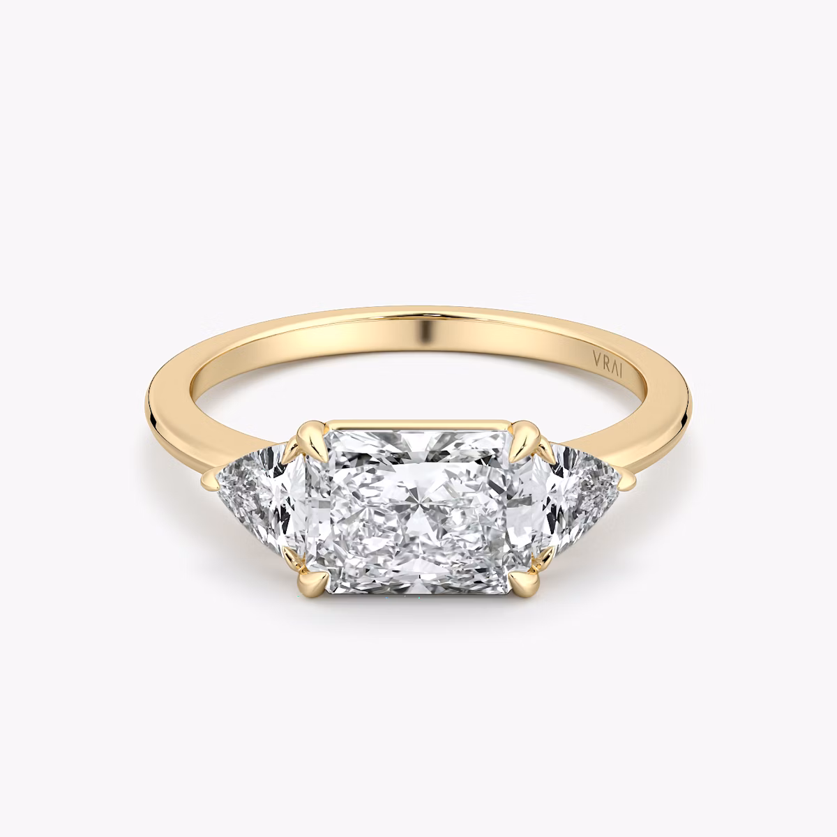 The Three Stone | Radiant | 18k | Yellow Gold | bandAccent: Plain | diamondOrientation: horizontal | sideStoneCarat: 0.25ct | sideStoneShape: Trillion | caratWeight: other