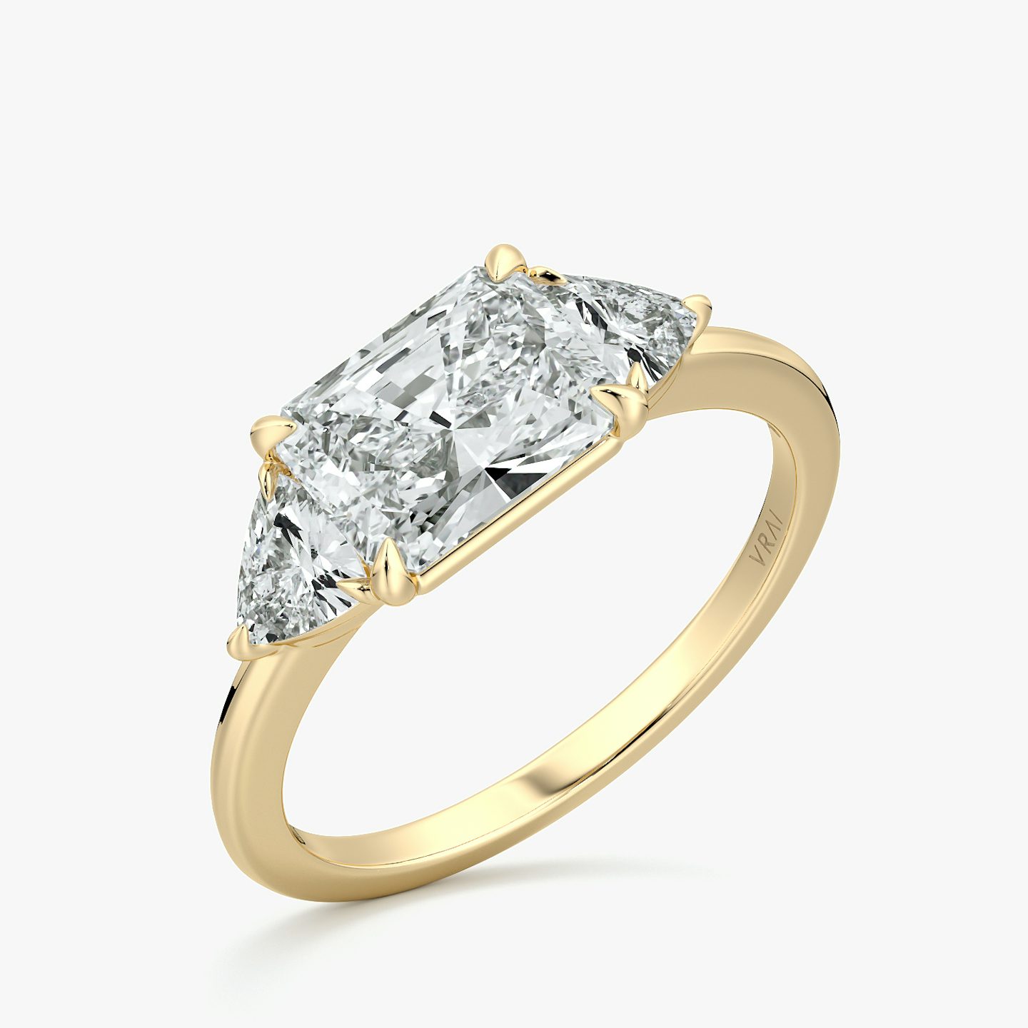 The Three Stone | Radiant | 18k | Yellow Gold | bandAccent: Plain | diamondOrientation: horizontal | sideStoneCarat: 0.25ct | sideStoneShape: Trillion | caratWeight: other